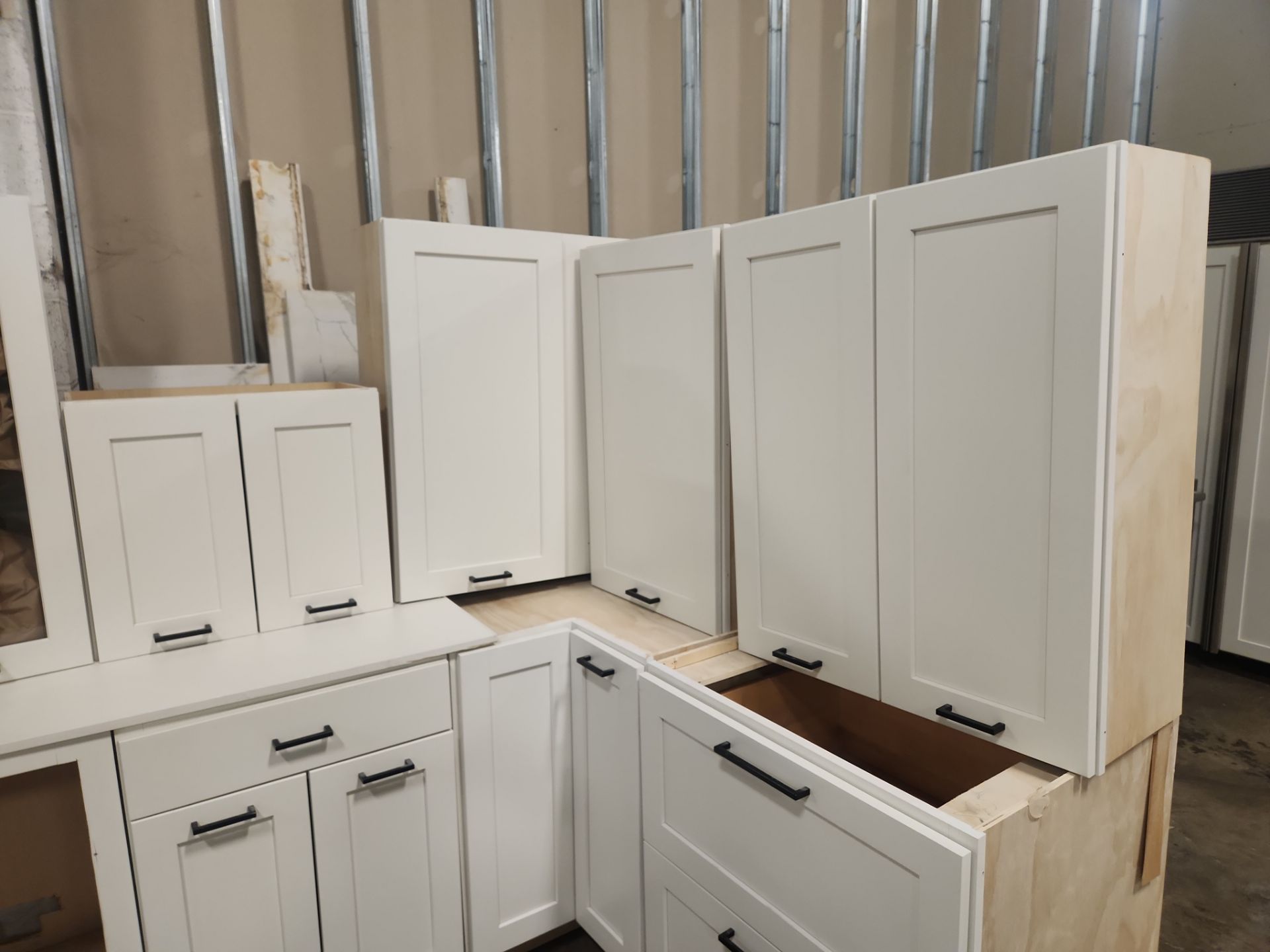 ÒThe WesterlyÓ Transitional White Kitchen with Island, 48" Sub-Zero Refrigerator and Bosch Appliances