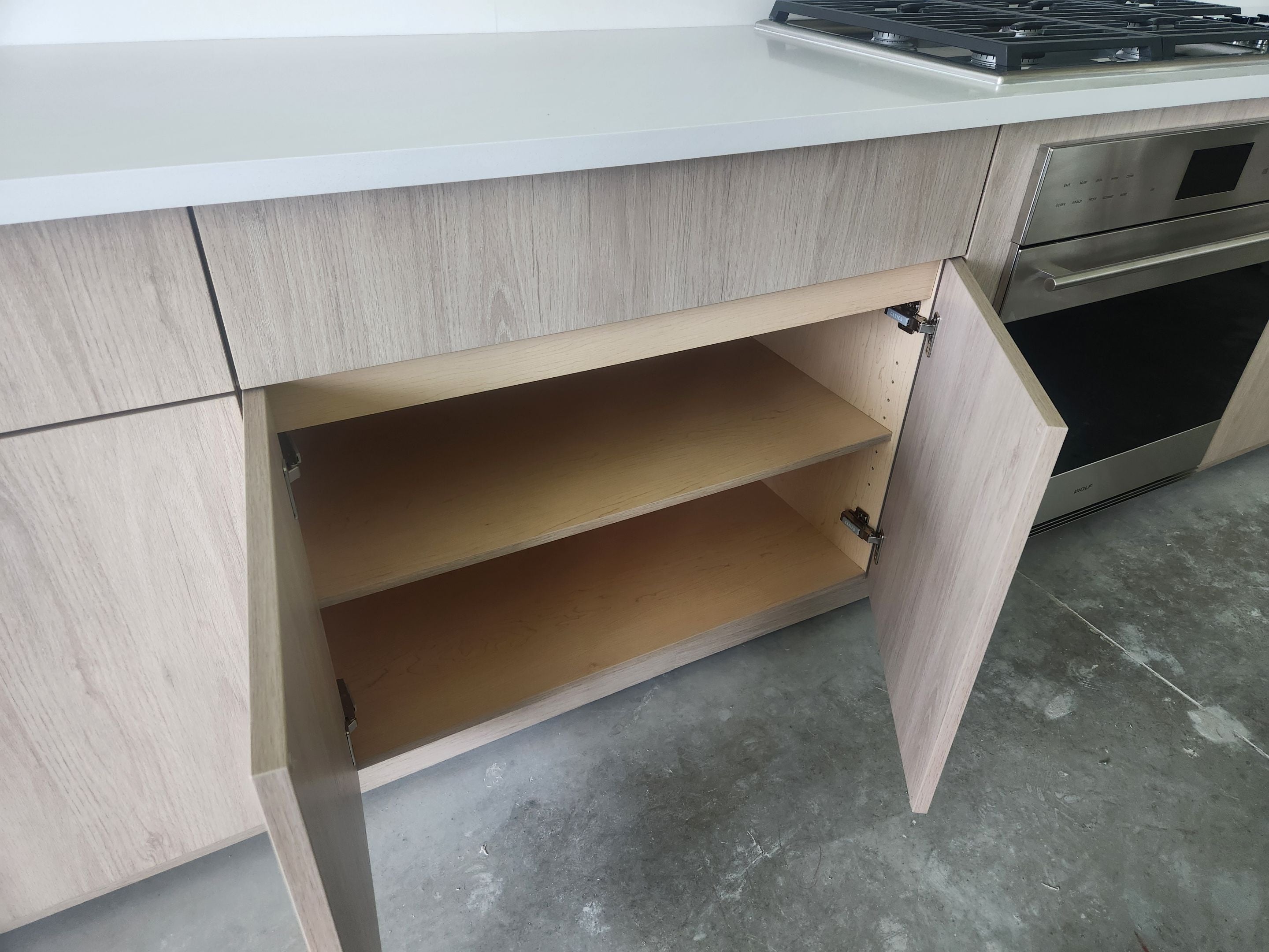 Cabico Sandy Oak Transitional Kitchen with Island & Wolf Appliances