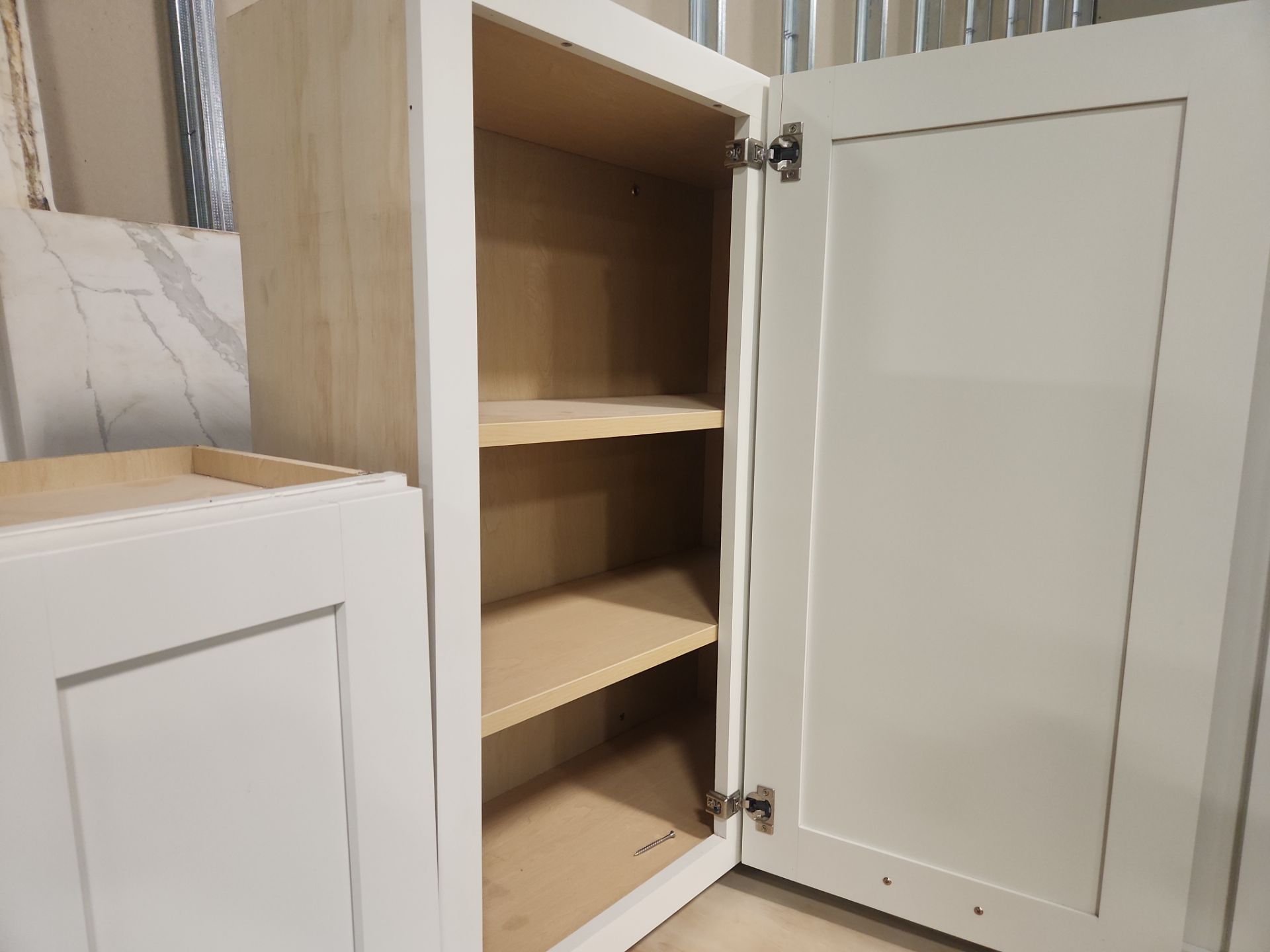 ÒThe WesterlyÓ Transitional White Kitchen with Island, 48" Sub-Zero Refrigerator and Bosch Appliances
