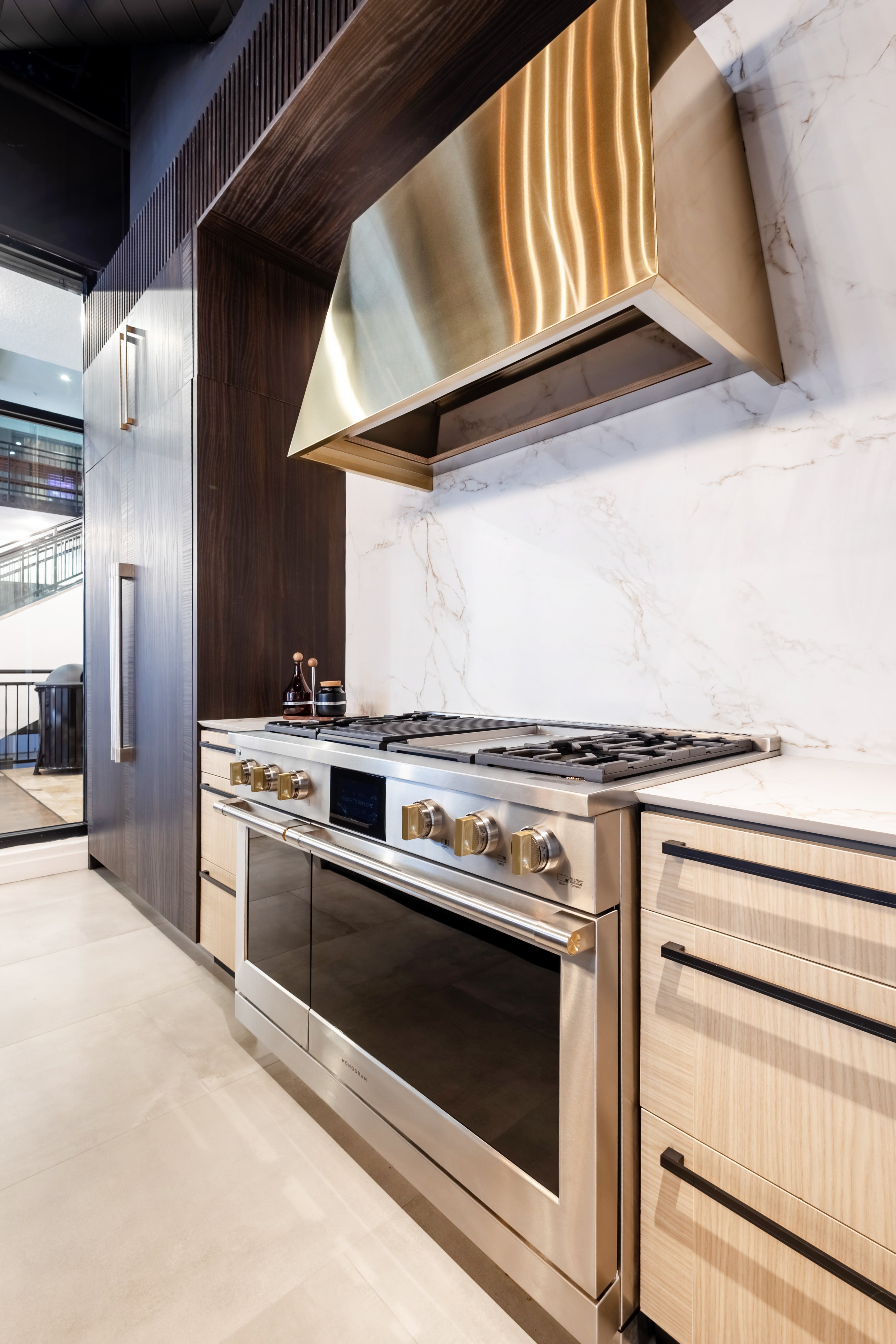 Azzurri Casa Transitional Kitchen with Double Waterfall Island, Dekton Countertops & Monogram Appliances