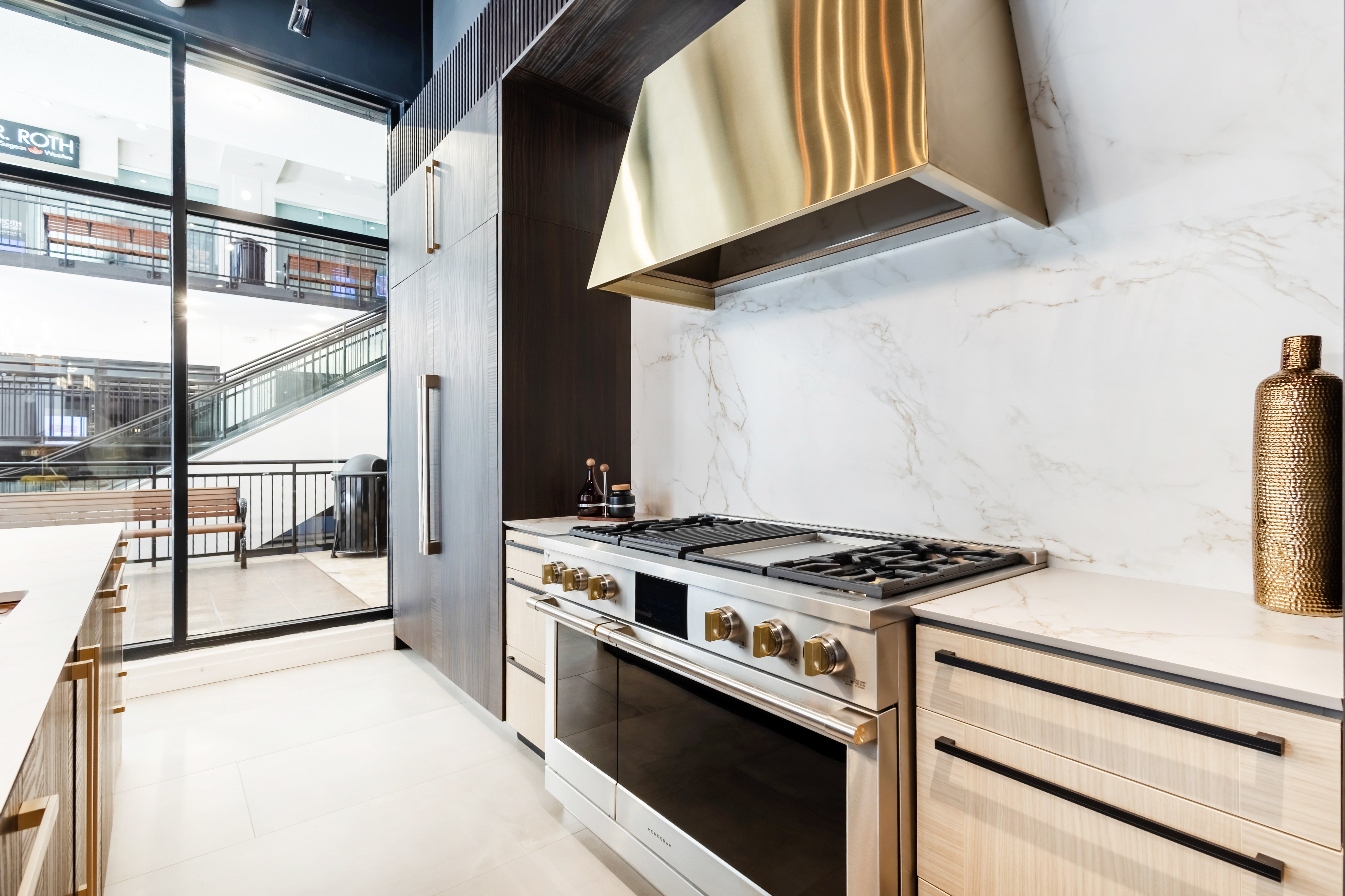 Azzurri Casa Transitional Kitchen with Double Waterfall Island, Dekton Countertops & Monogram Appliances