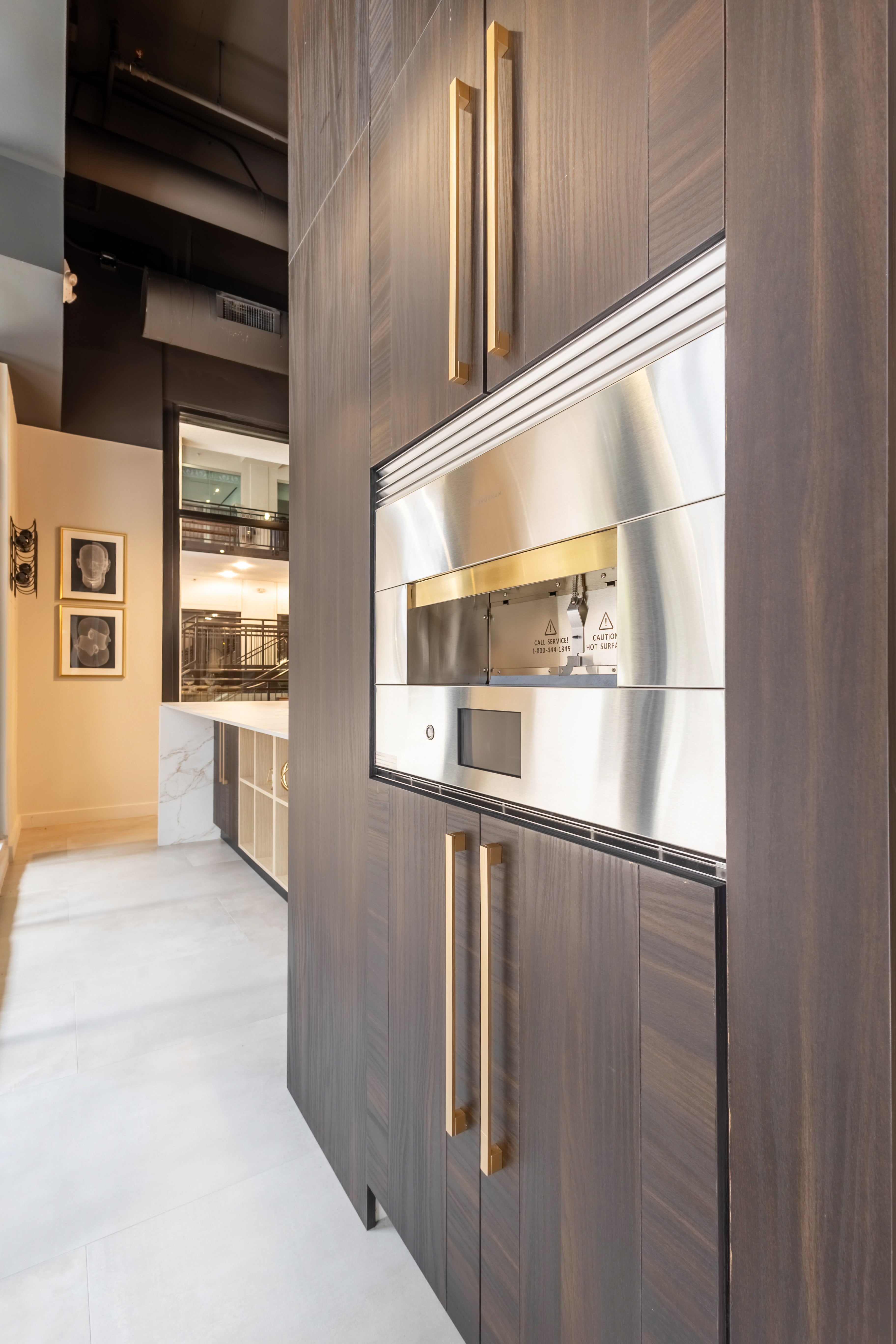 Azzurri Casa Transitional Kitchen with Double Waterfall Island, Dekton Countertops & Monogram Appliances