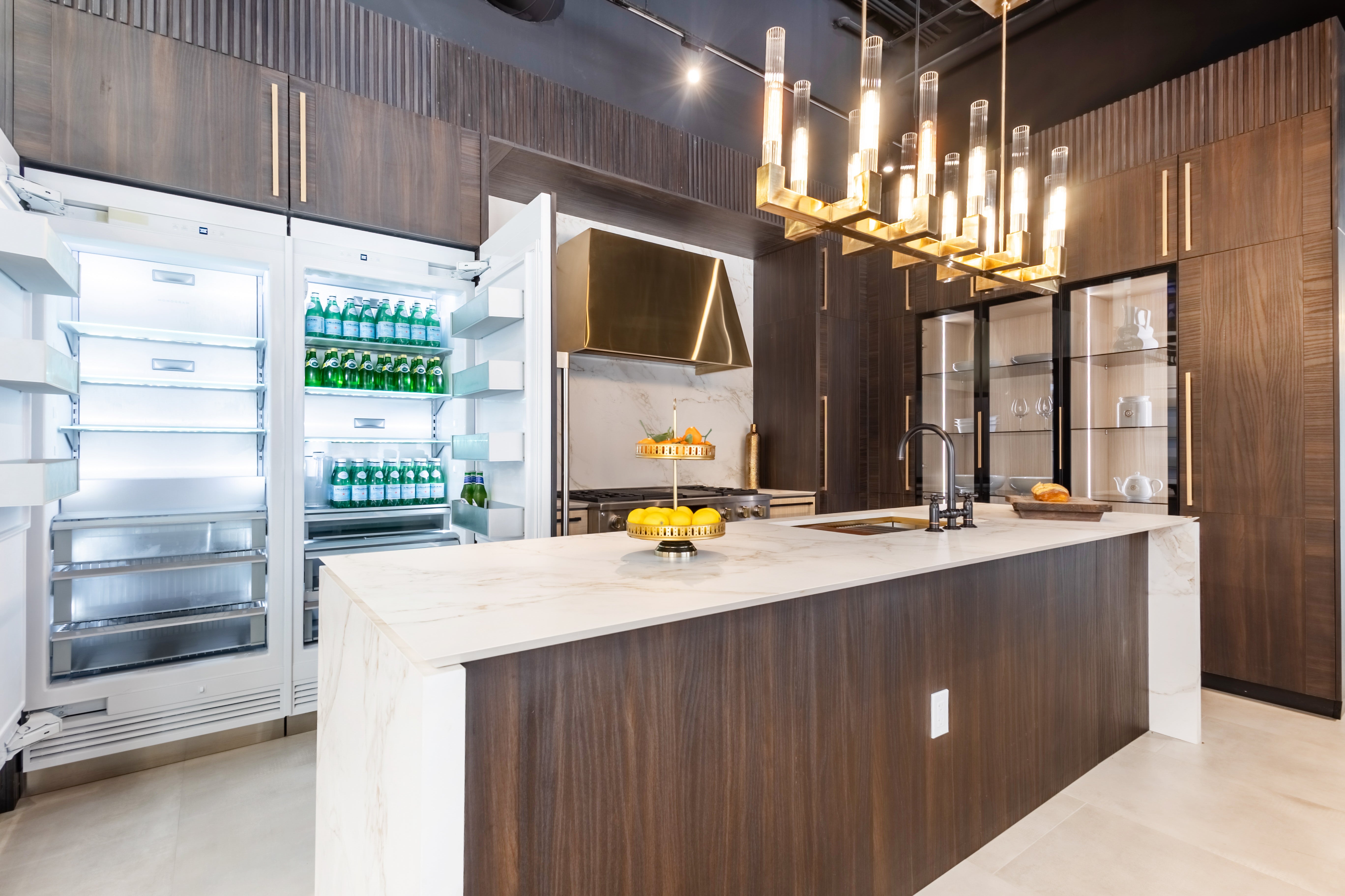Azzurri Casa Transitional Kitchen with Double Waterfall Island, Dekton Countertops & Monogram Appliances