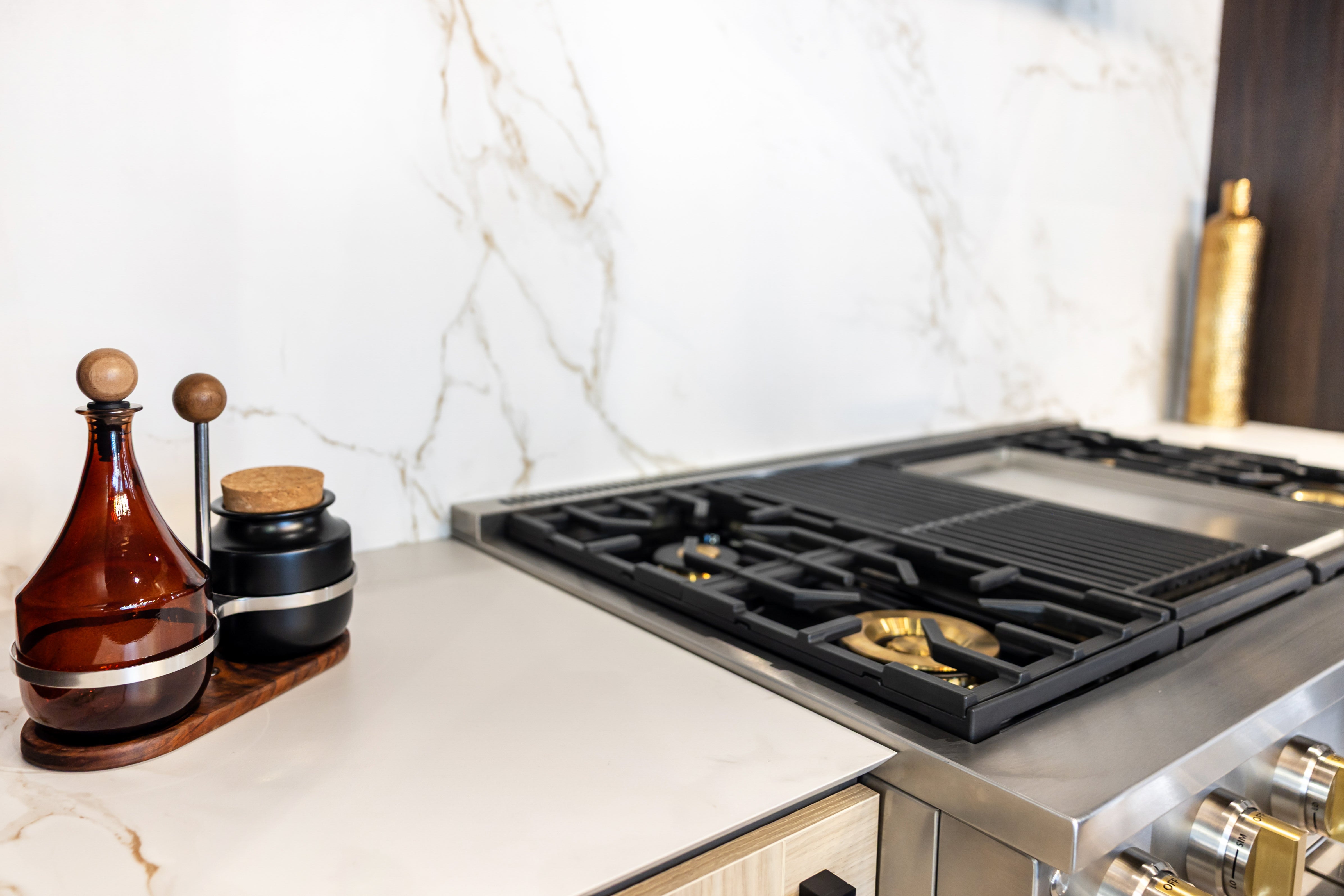Azzurri Casa Transitional Kitchen with Double Waterfall Island, Dekton Countertops & Monogram Appliances