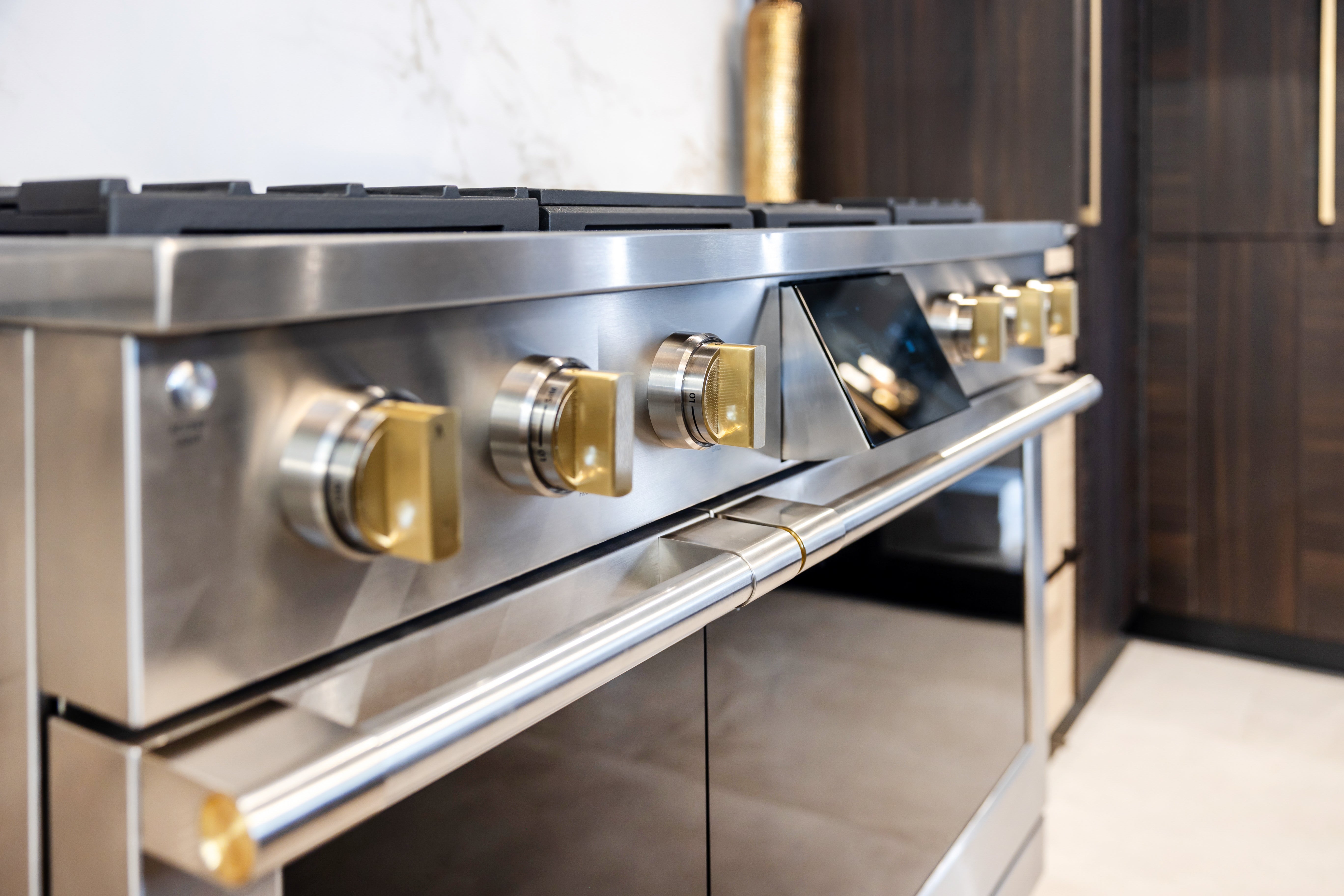 Azzurri Casa Transitional Kitchen with Double Waterfall Island, Dekton Countertops & Monogram Appliances