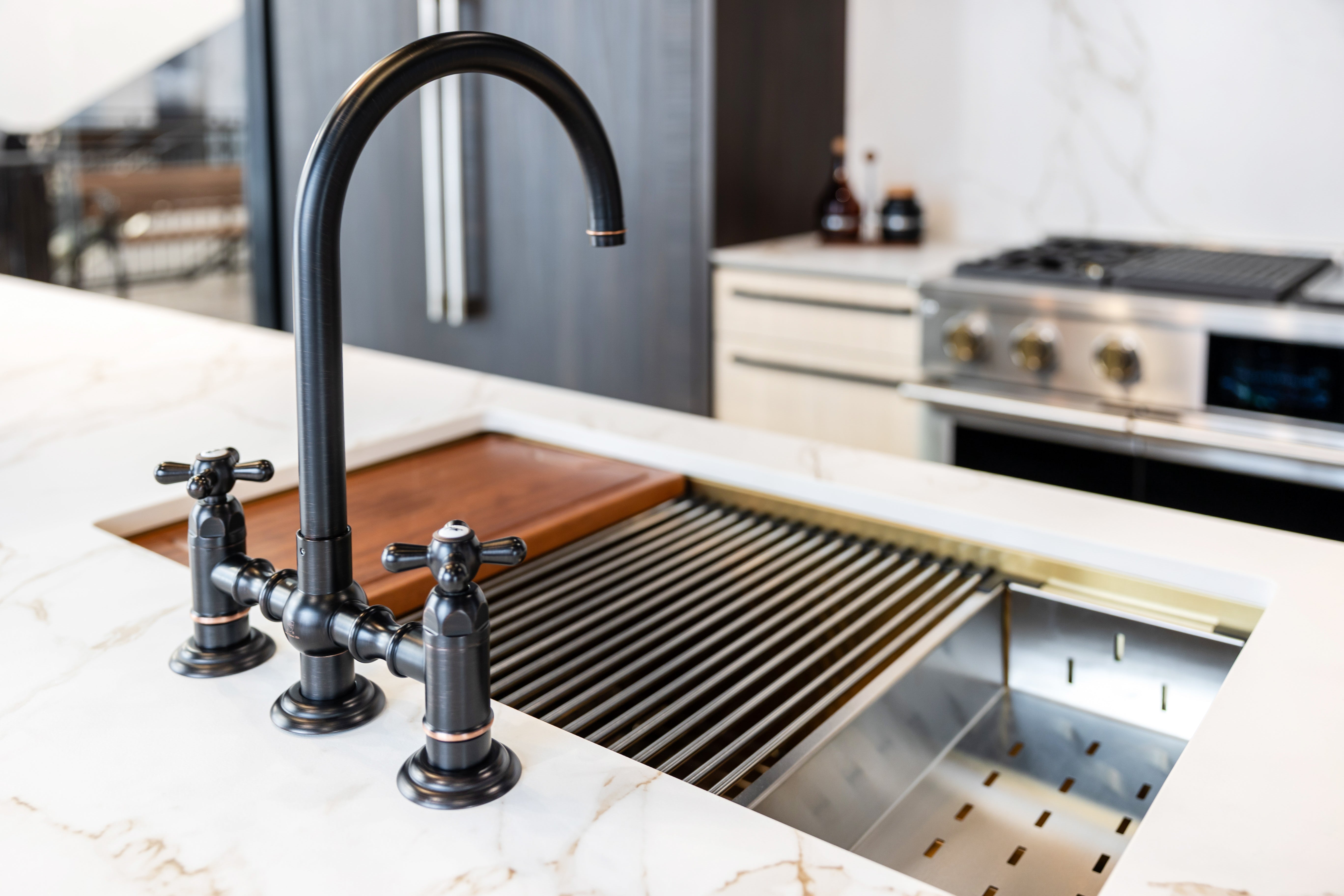 Azzurri Casa Transitional Kitchen with Double Waterfall Island, Dekton Countertops & Monogram Appliances