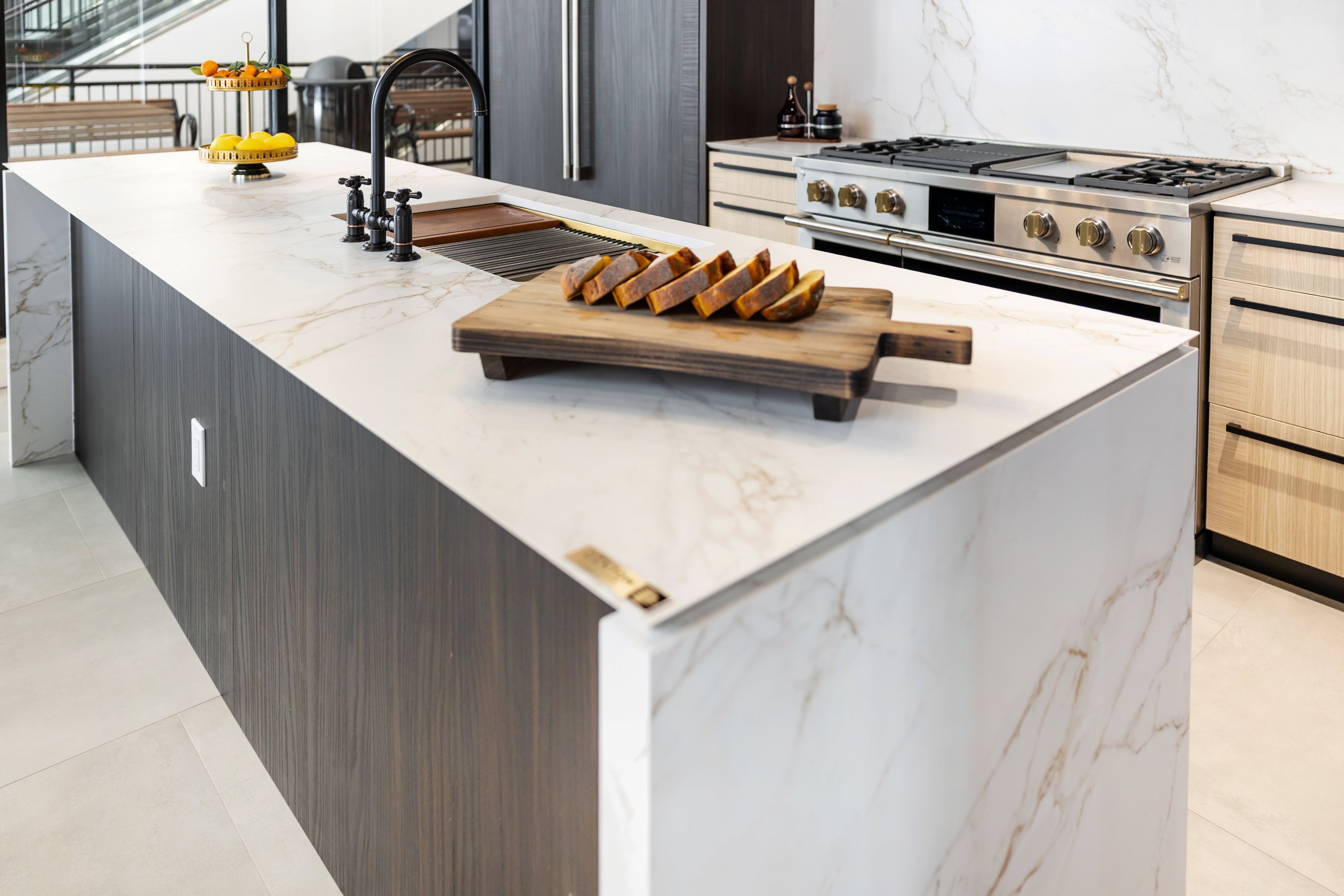 Azzurri Casa Transitional Kitchen with Double Waterfall Island, Dekton Countertops & Monogram Appliances