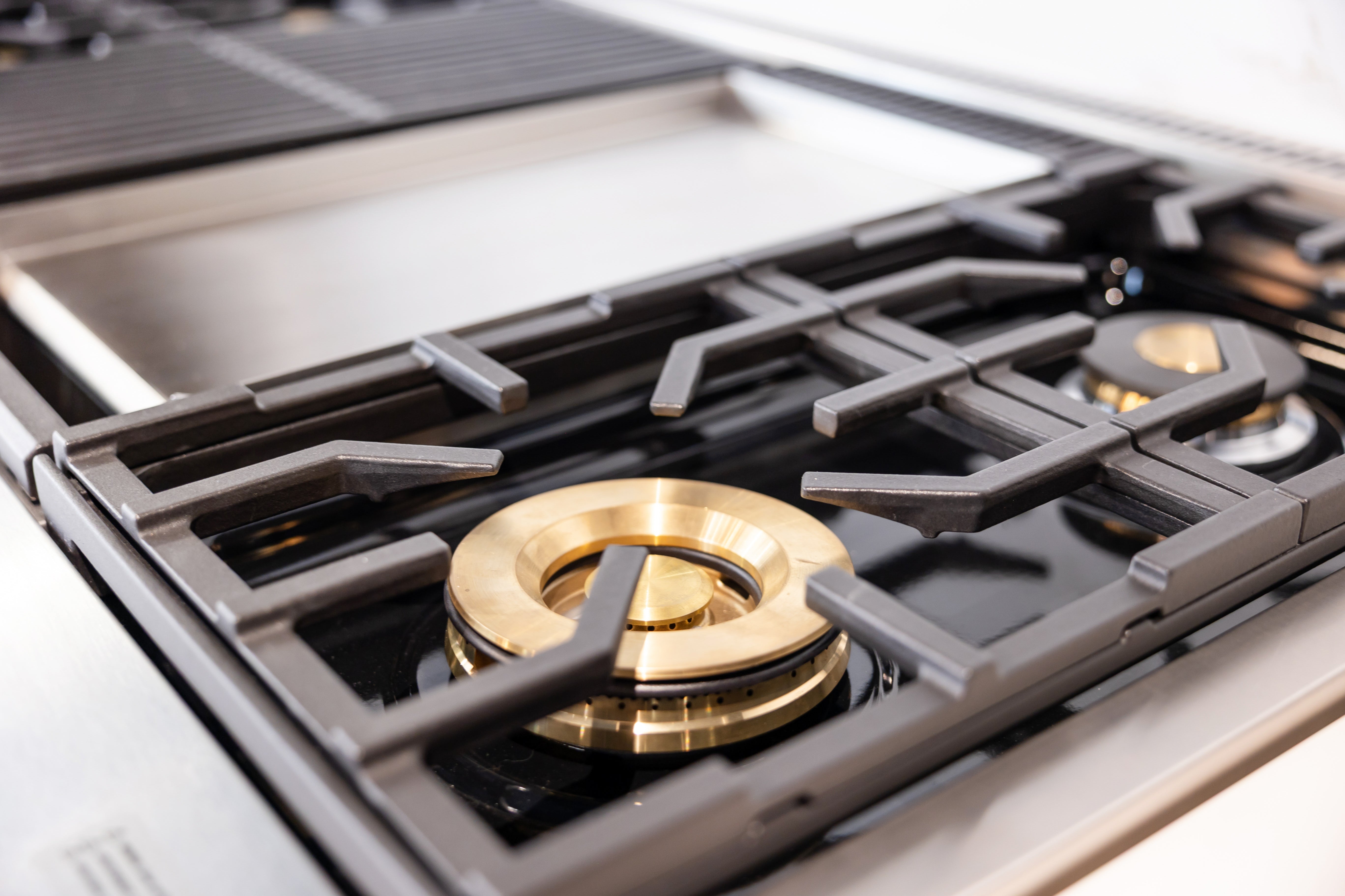 Azzurri Casa Transitional Kitchen with Double Waterfall Island, Dekton Countertops & Monogram Appliances