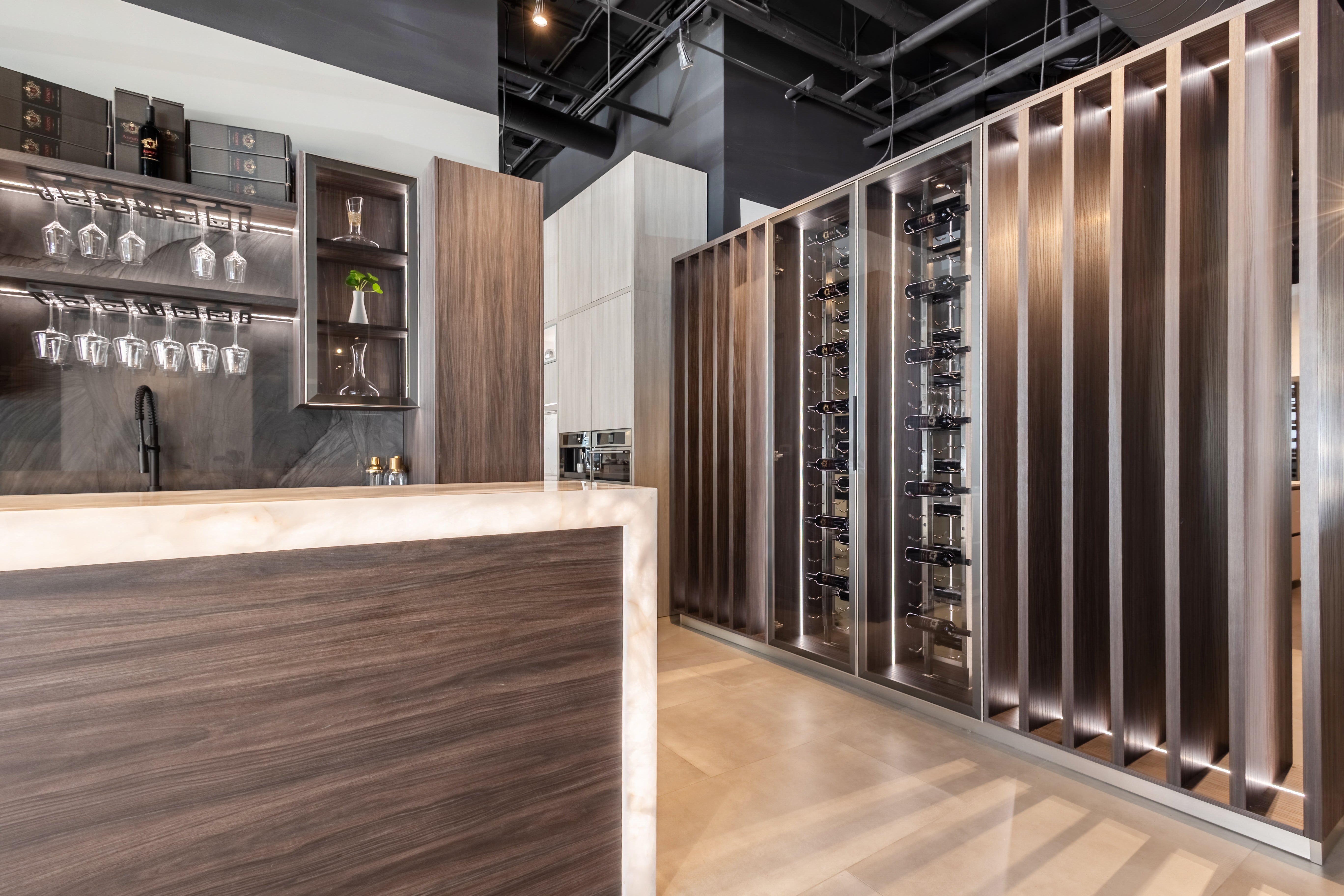Azzurri Casa Modern Wood Paneled Wet Wine Bar with Wine Wall and Onyx Countertops