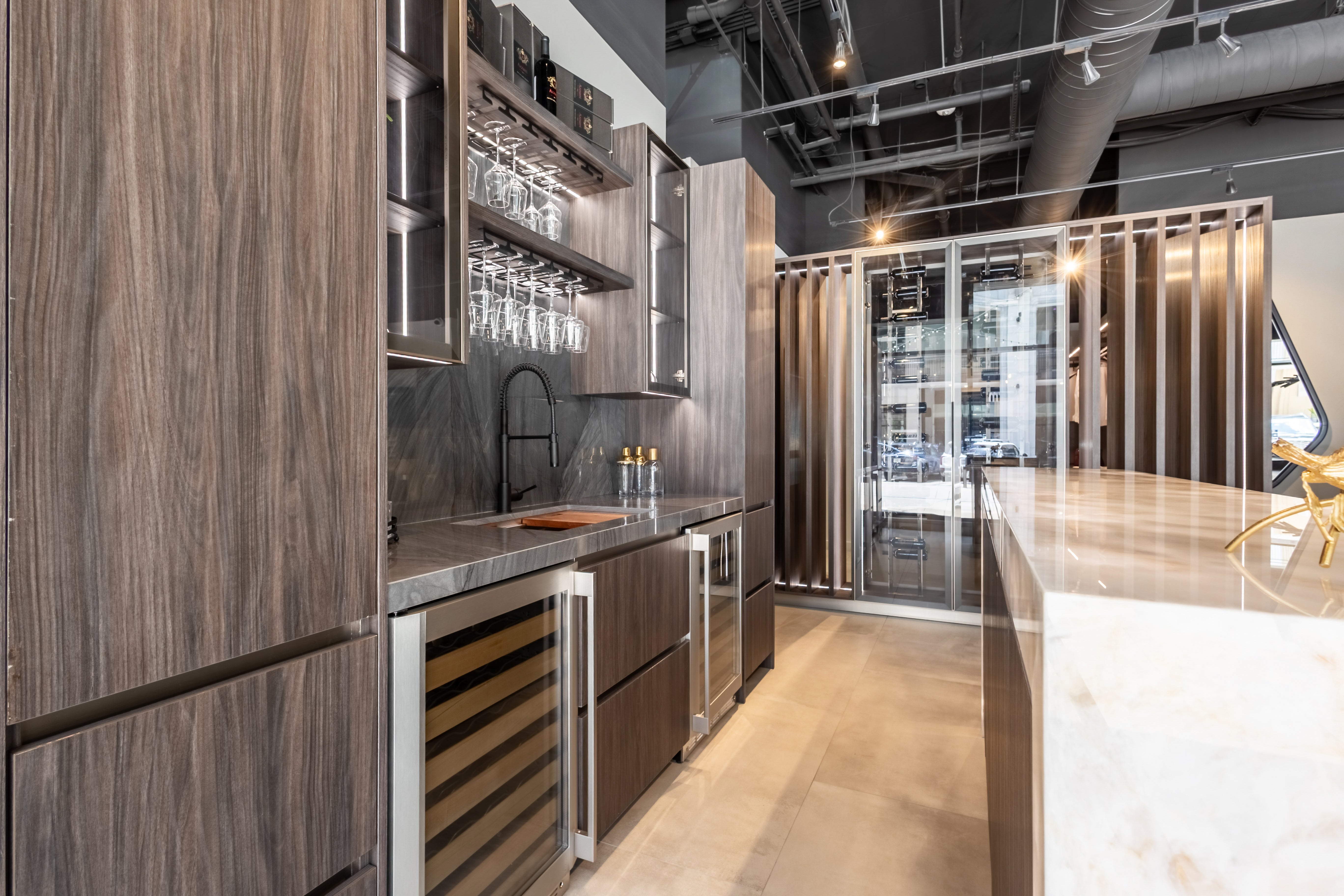 Azzurri Casa Modern Wood Paneled Wet Wine Bar with Wine Wall and Onyx Countertops