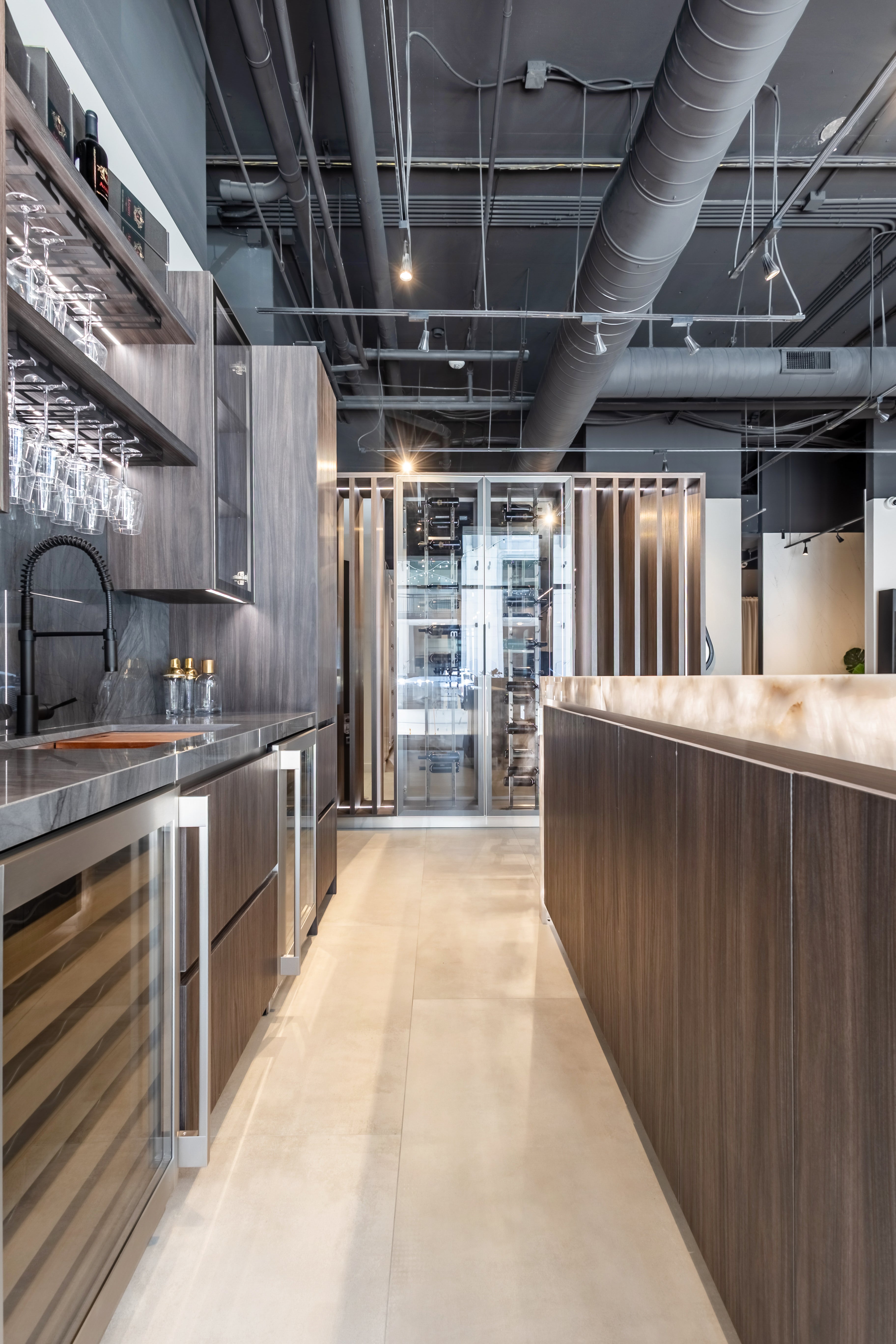 Azzurri Casa Modern Wood Paneled Wet Wine Bar with Wine Wall and Onyx Countertops