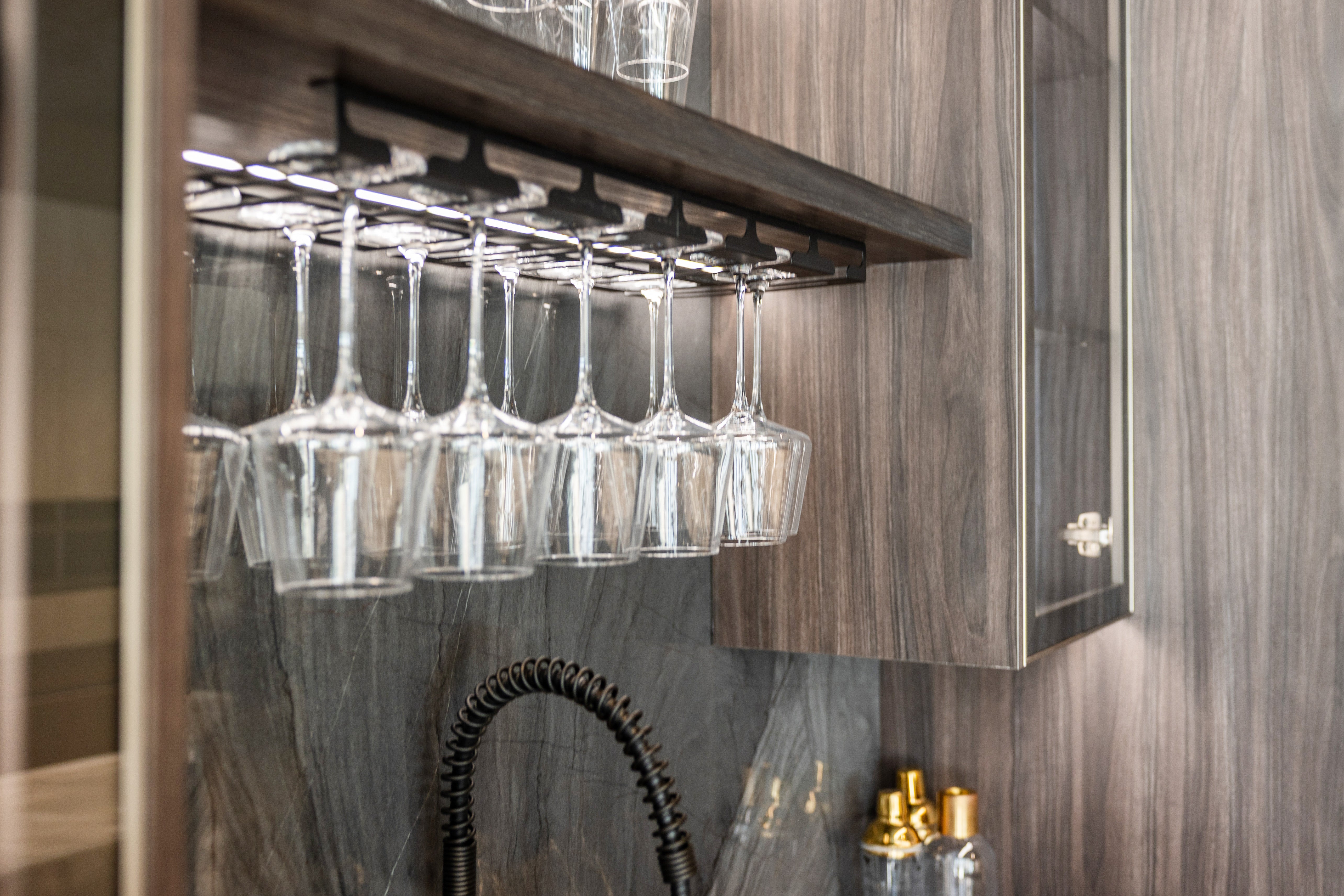 Azzurri Casa Modern Wood Paneled Wet Wine Bar with Wine Wall and Onyx Countertops