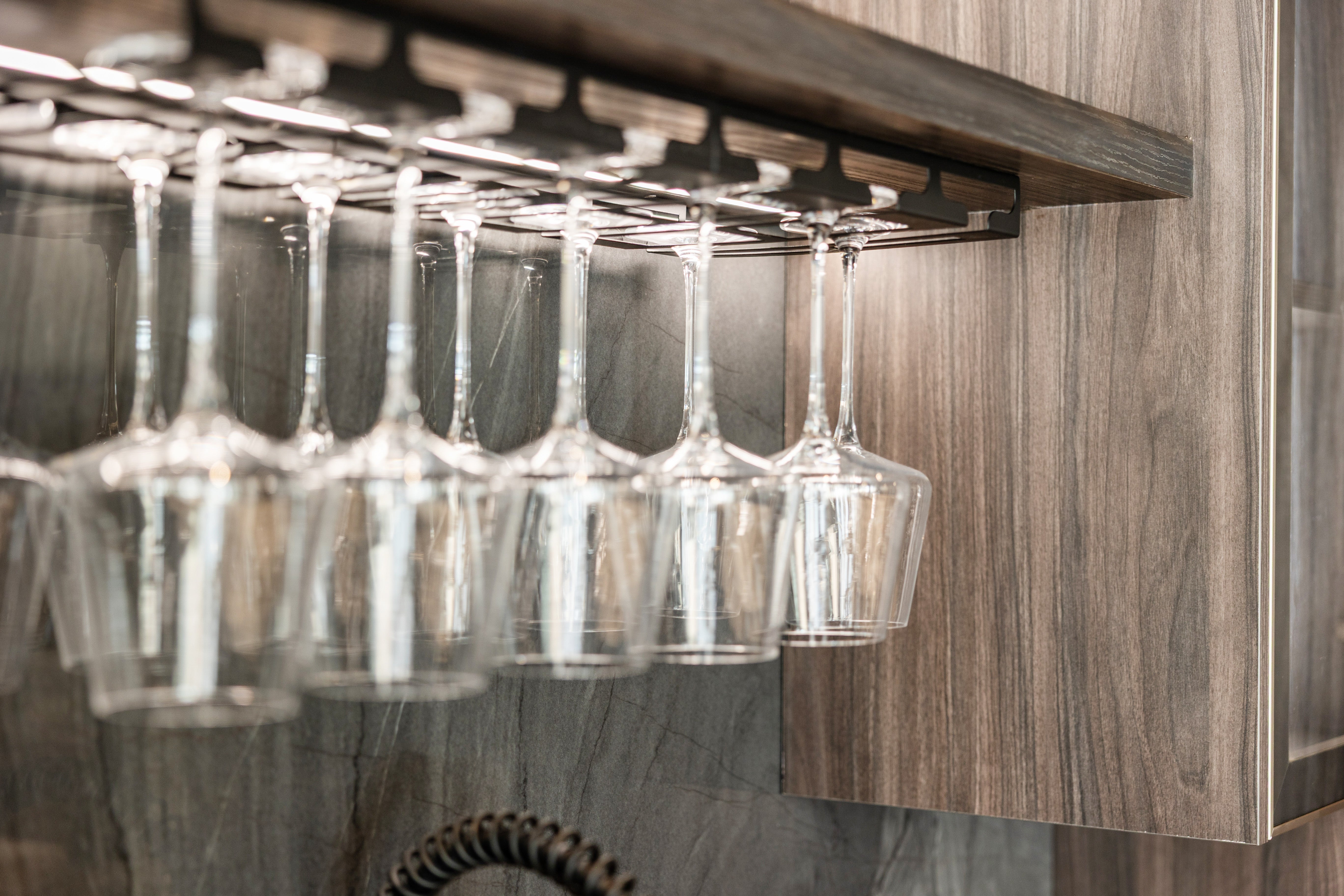 Azzurri Casa Modern Wood Paneled Wet Wine Bar with Wine Wall and Onyx Countertops