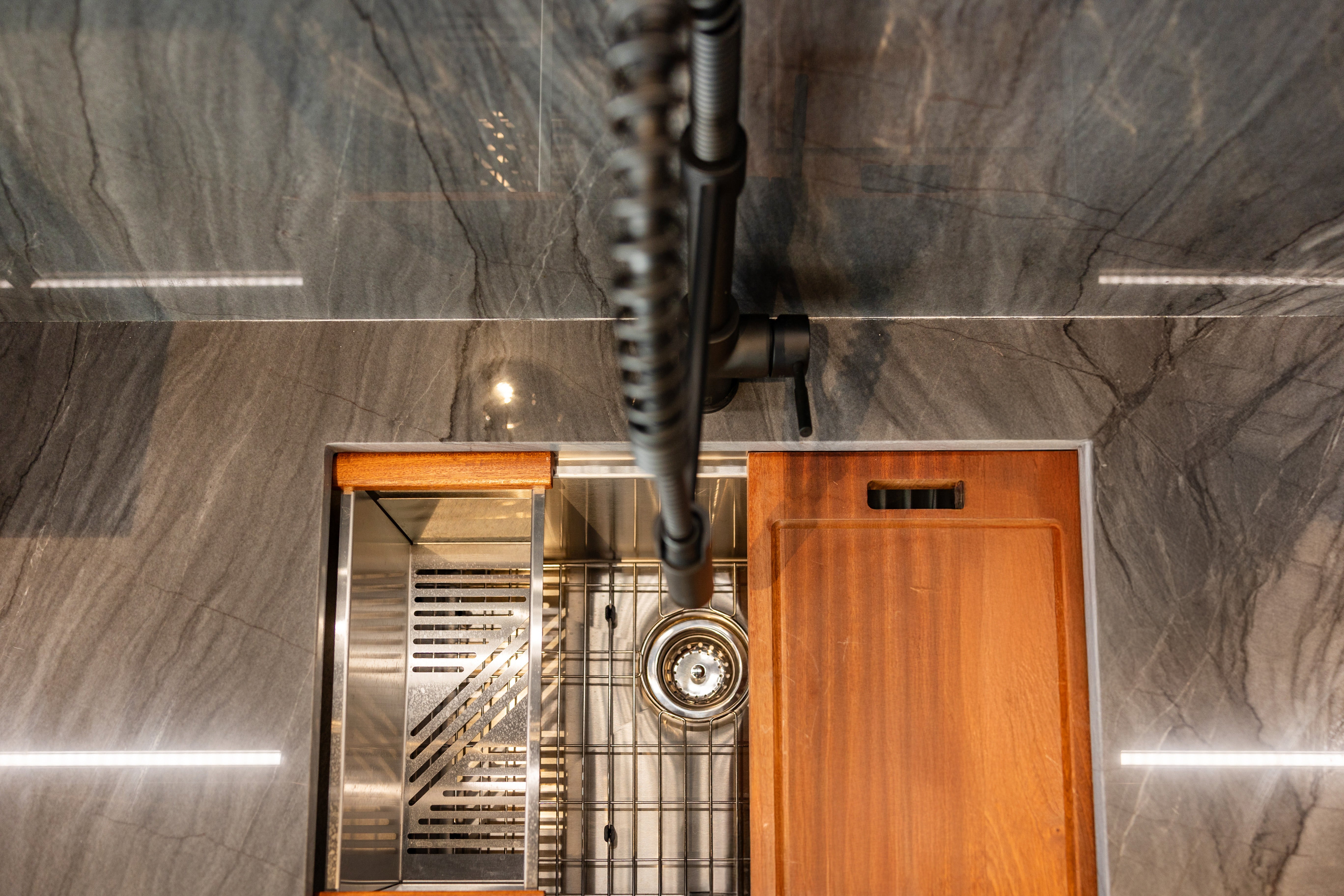 Azzurri Casa Modern Wood Paneled Wet Wine Bar with Wine Wall and Onyx Countertops