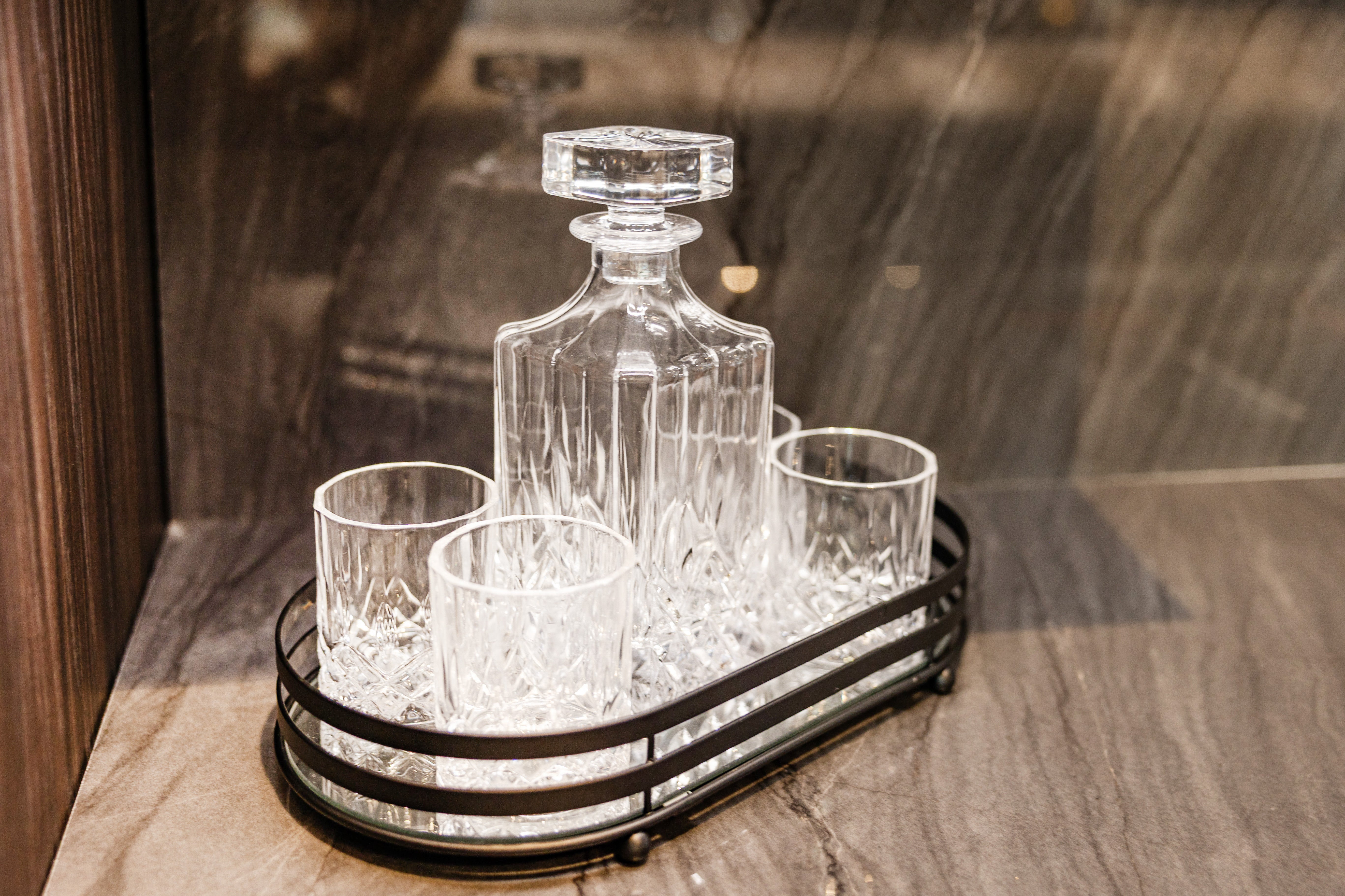 Azzurri Casa Modern Wood Paneled Wet Wine Bar with Wine Wall and Onyx Countertops