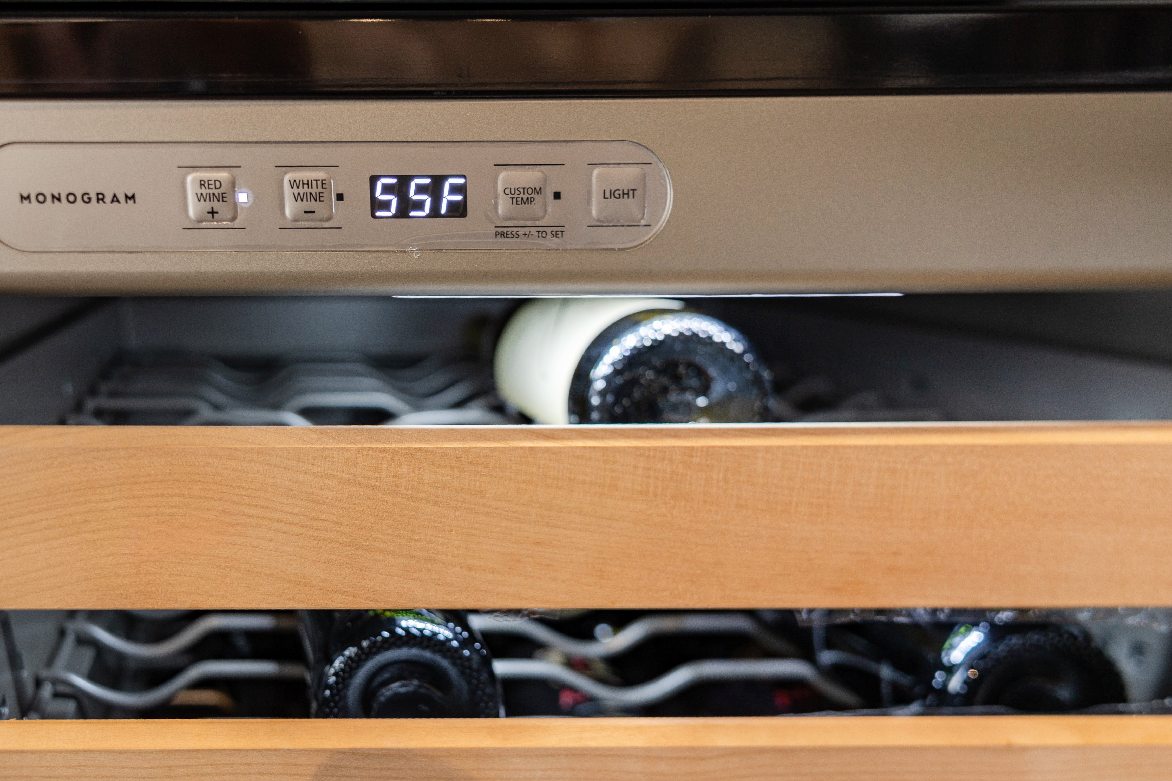 Azzurri Casa Modern Wood Paneled Wet Wine Bar with Wine Wall and Onyx Countertops