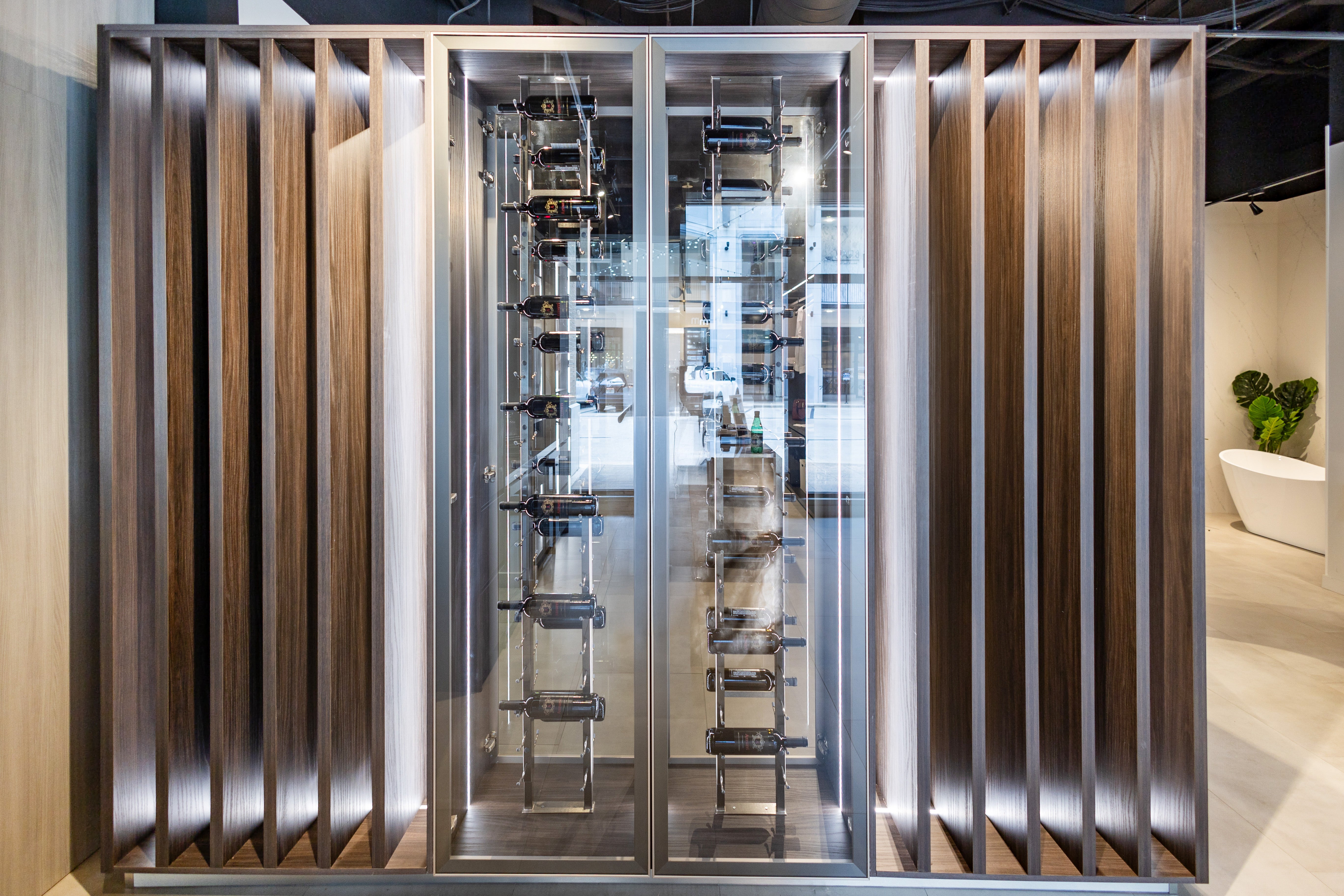 Azzurri Casa Modern Wood Paneled Wet Wine Bar with Wine Wall and Onyx Countertops