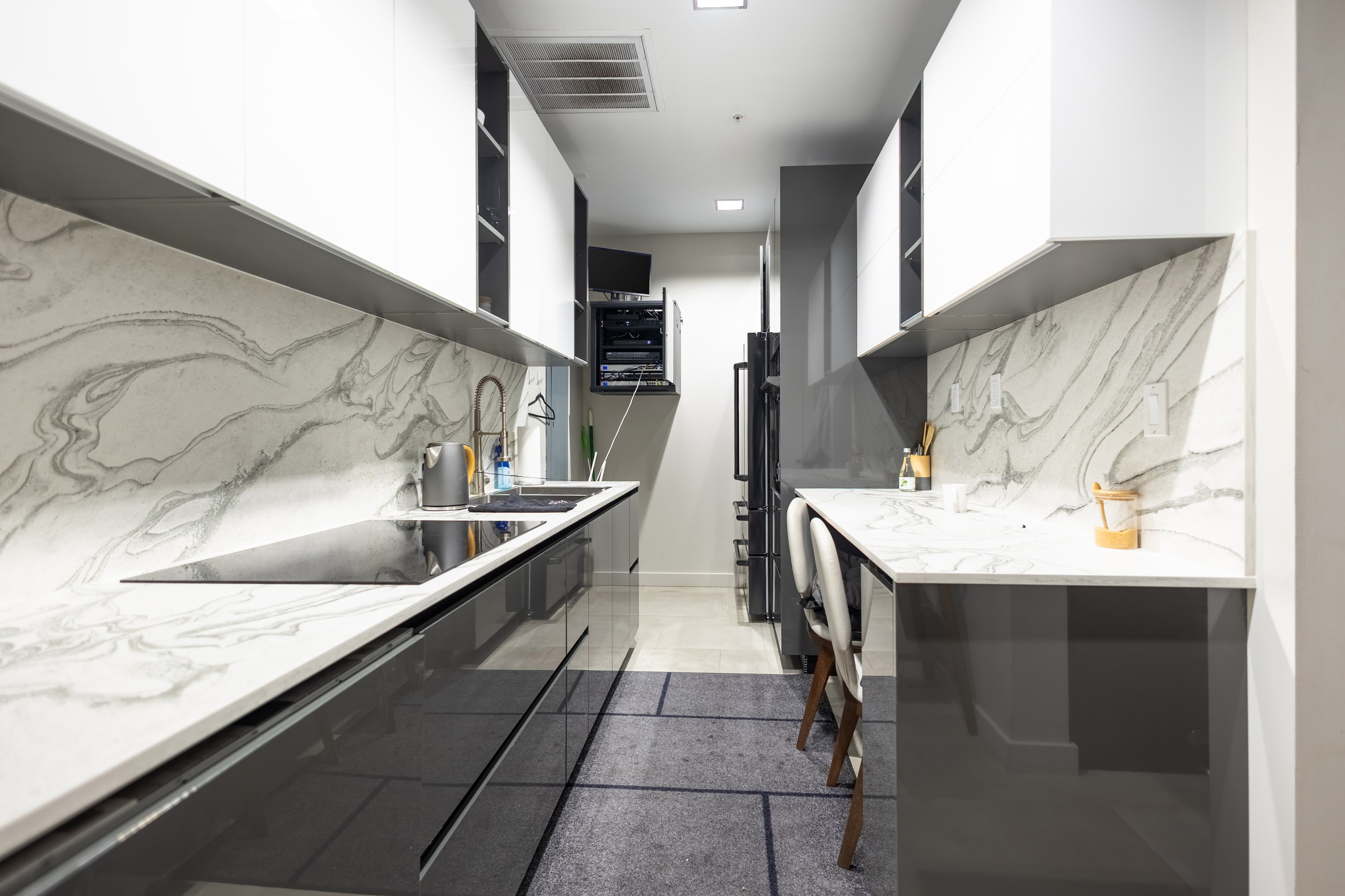 Azzurri Casa Glossy Grey & White Kitchen with Dekton Countertops and ZLINE Appliances