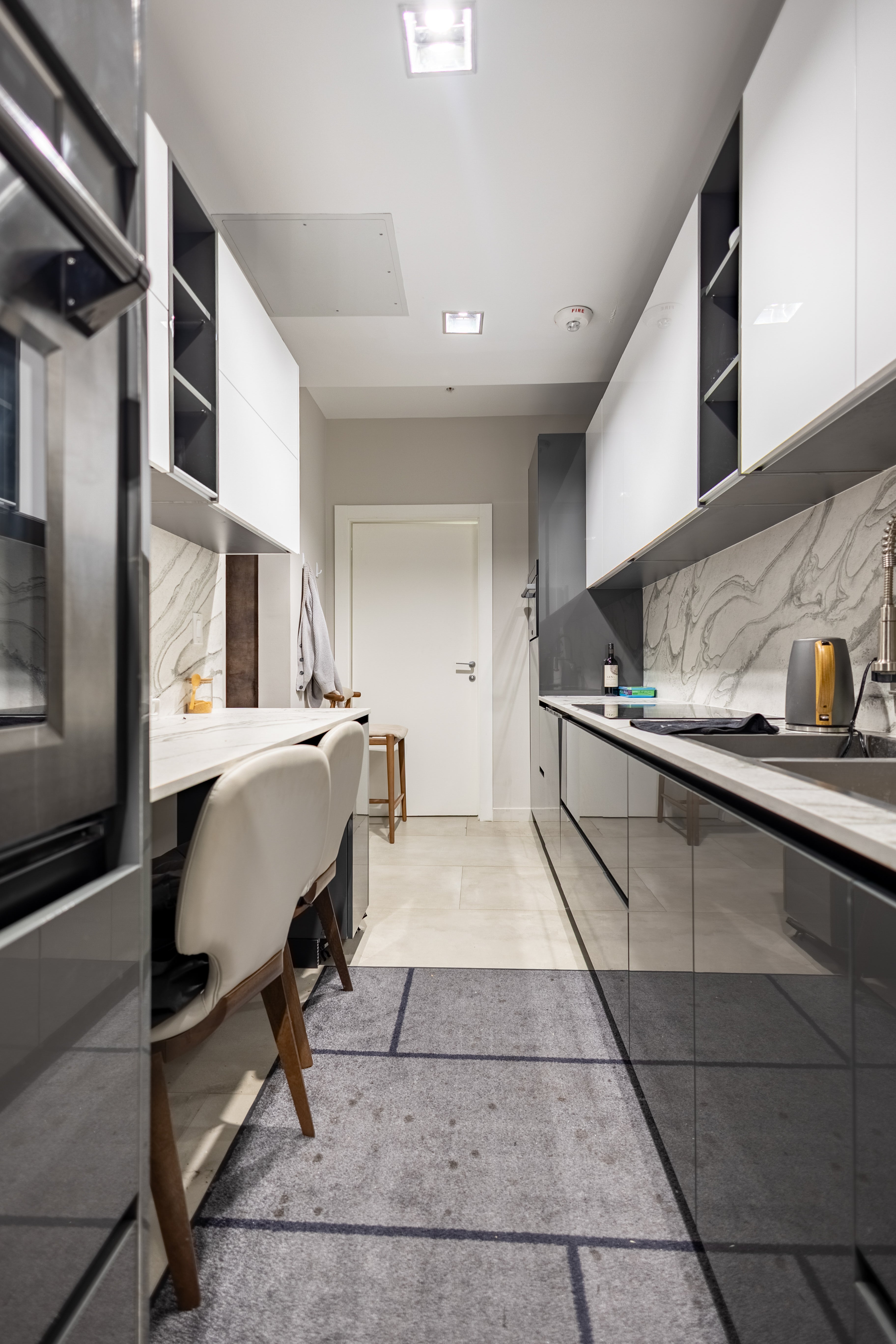 Azzurri Casa Glossy Grey & White Kitchen with Dekton Countertops and ZLINE Appliances
