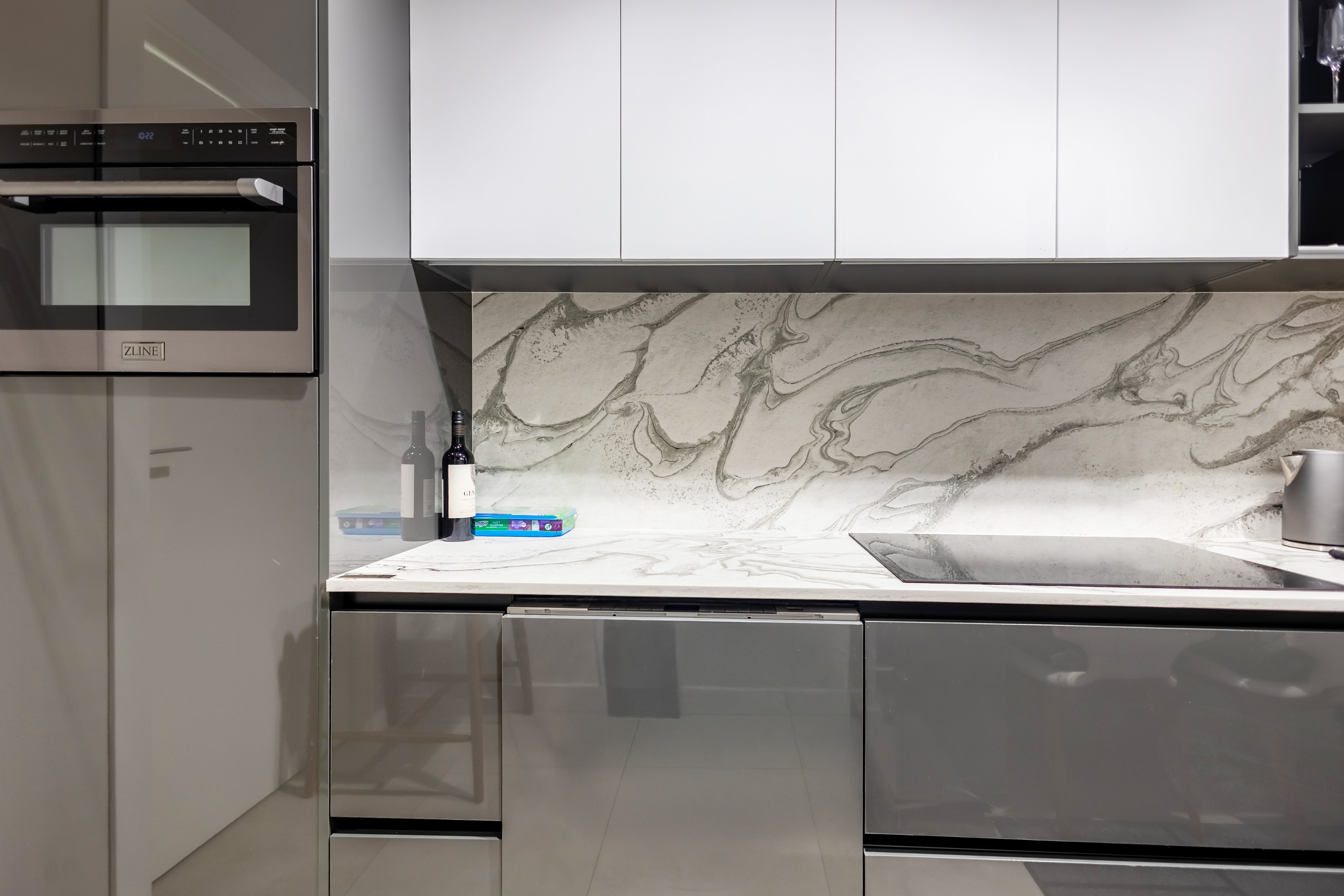 Azzurri Casa Glossy Grey & White Kitchen with Dekton Countertops and ZLINE Appliances