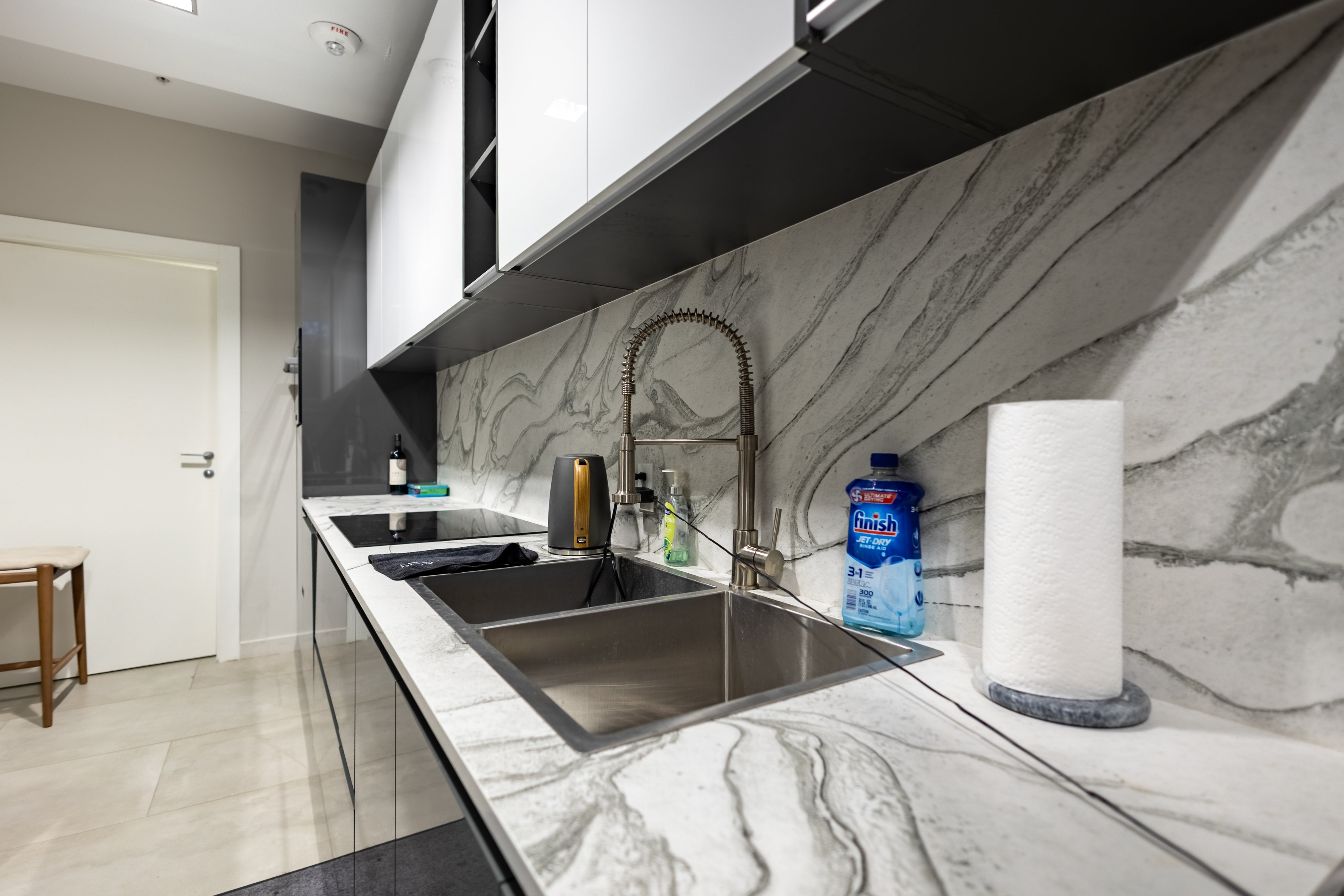 Azzurri Casa Glossy Grey & White Kitchen with Dekton Countertops and ZLINE Appliances