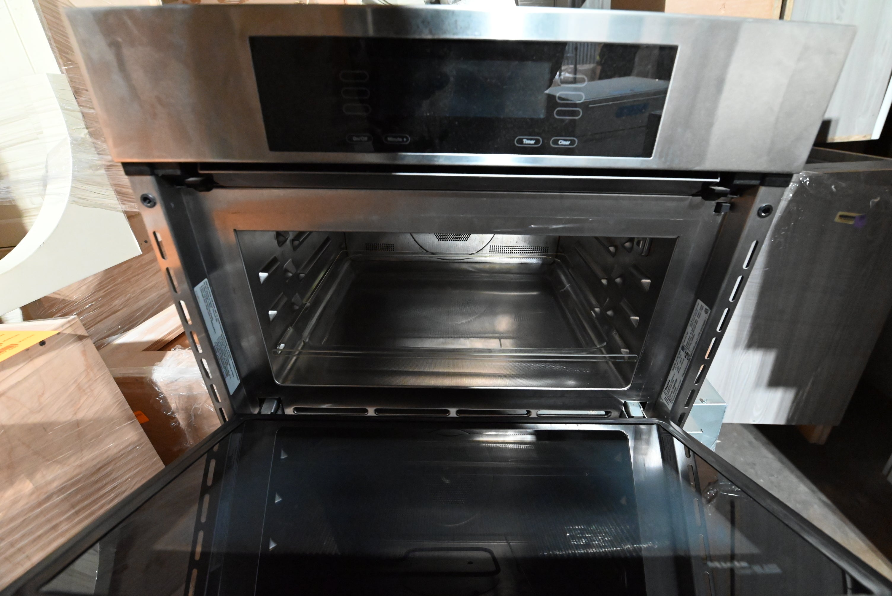 Bulthaup Modern Matte Grey Kitchen with Stone Countertops & Appliances