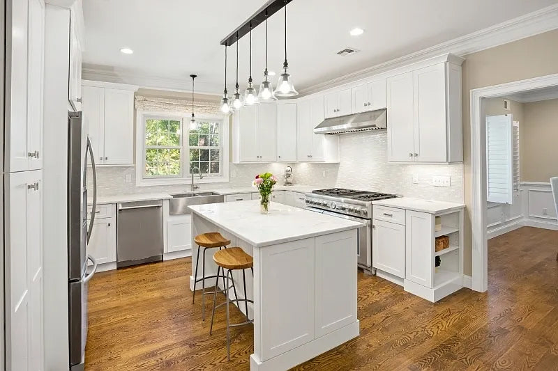 Fabuwood Transitional White Kitchen with Island and White Marble Countertops