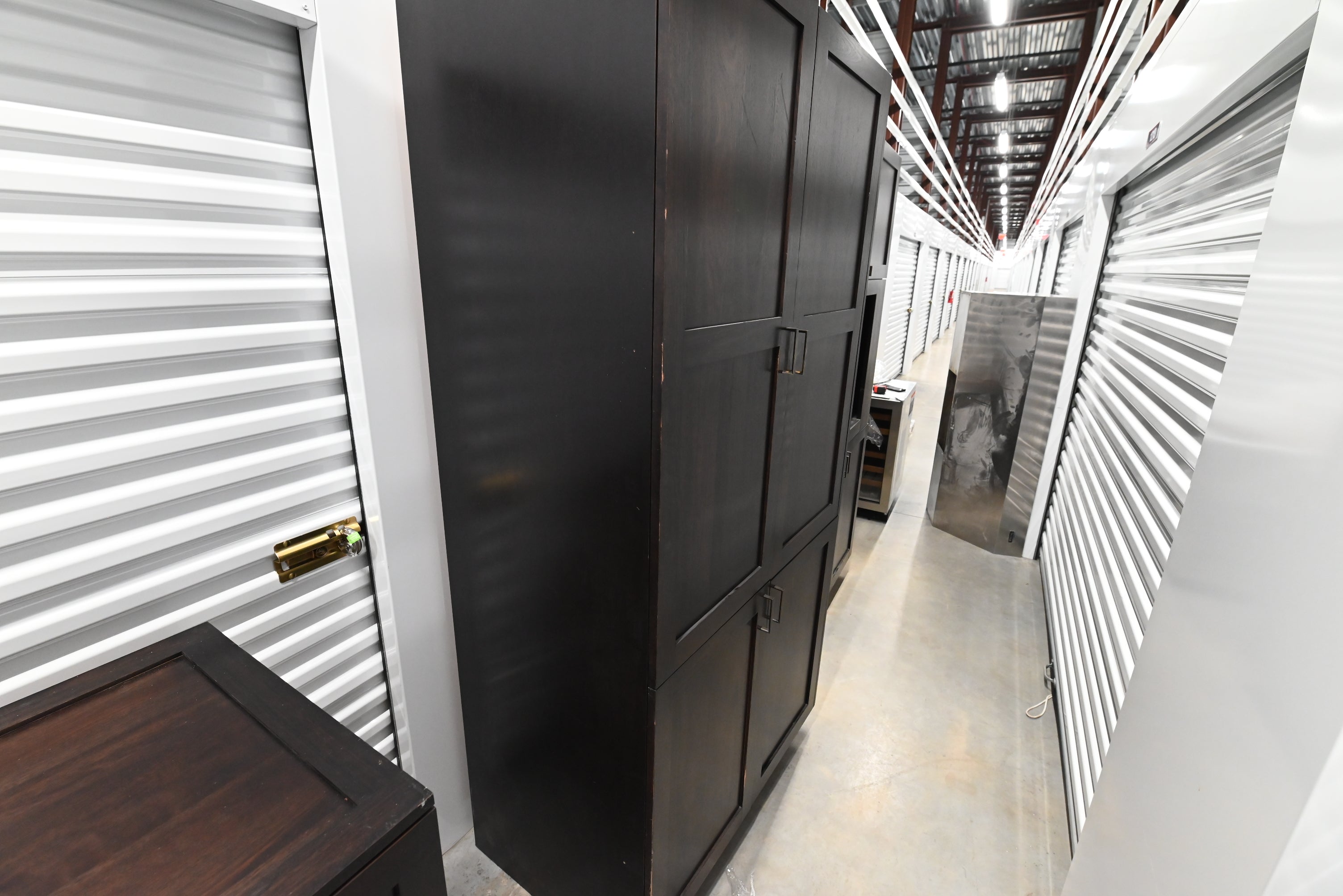 Transitional Dark Wooden Brown Kitchen with Island, Marble Countertops & Luxury Appliances