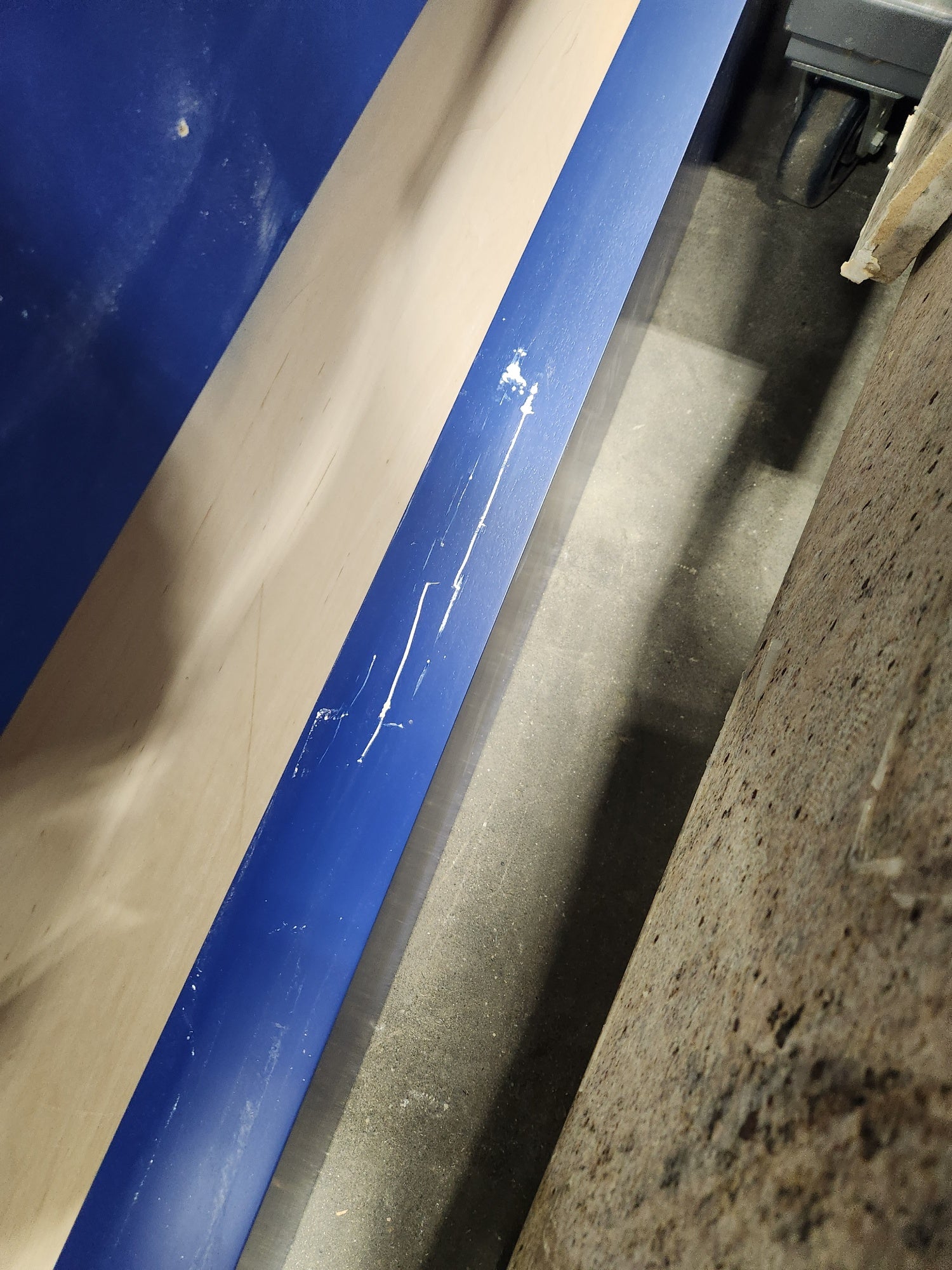 Gemcraft Navy Blue Pantry with White Quartz Countertops and Sub-Zero Tall Wine Cooler