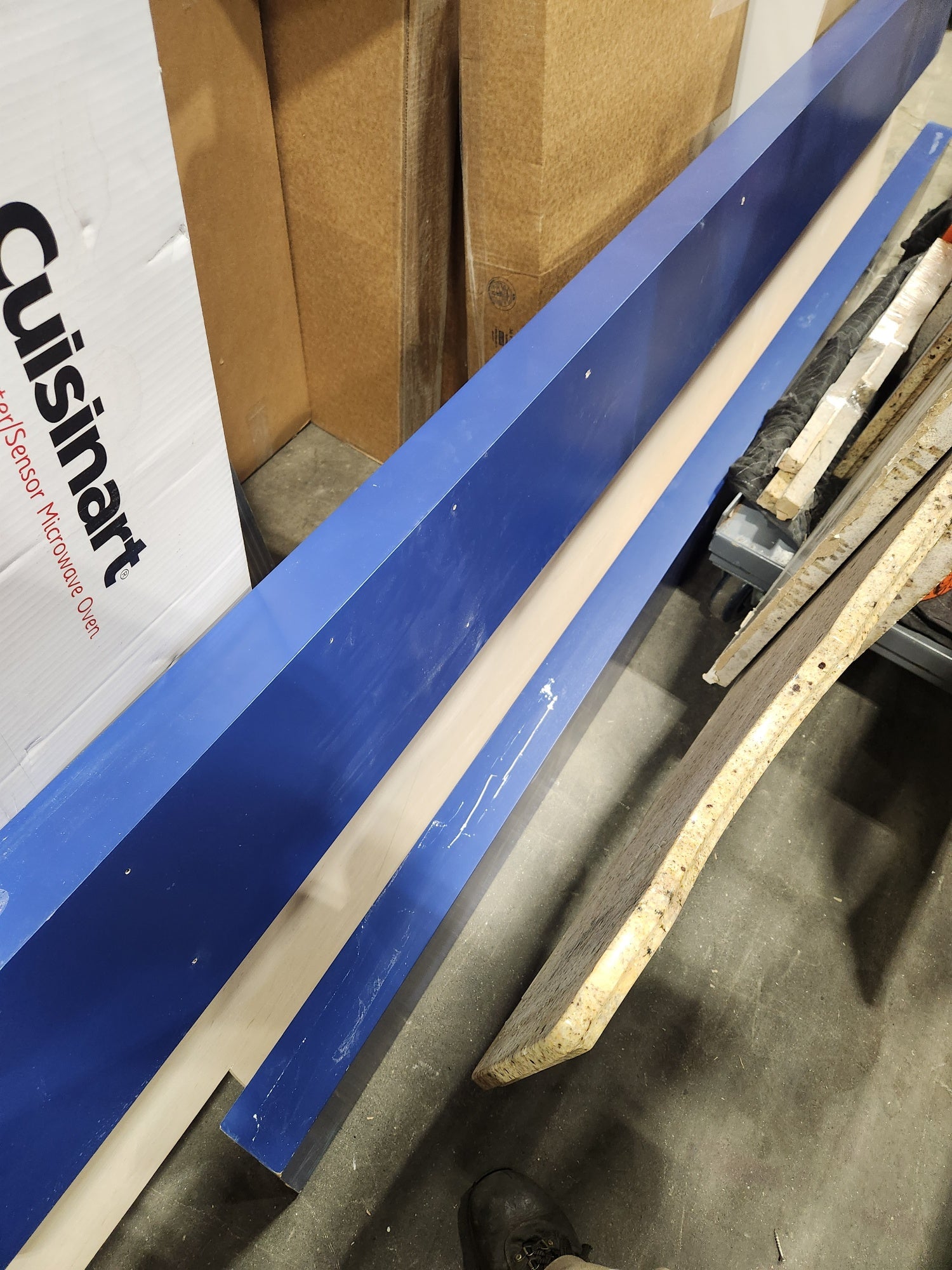 Gemcraft Navy Blue Pantry with White Quartz Countertops and Sub-Zero Tall Wine Cooler