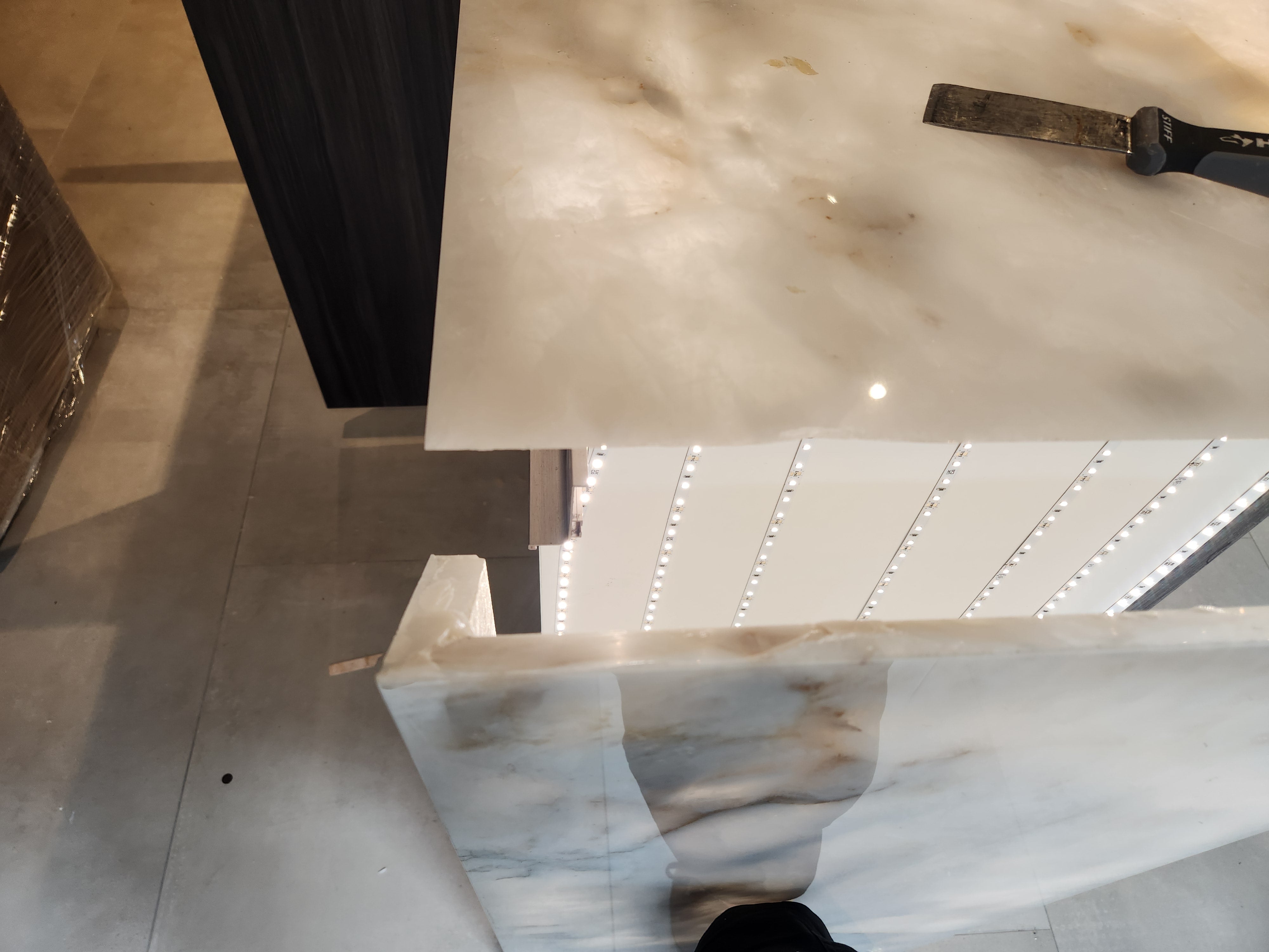 Azzurri Casa Modern Wood Paneled Wet Wine Bar with Wine Wall and Onyx Countertops