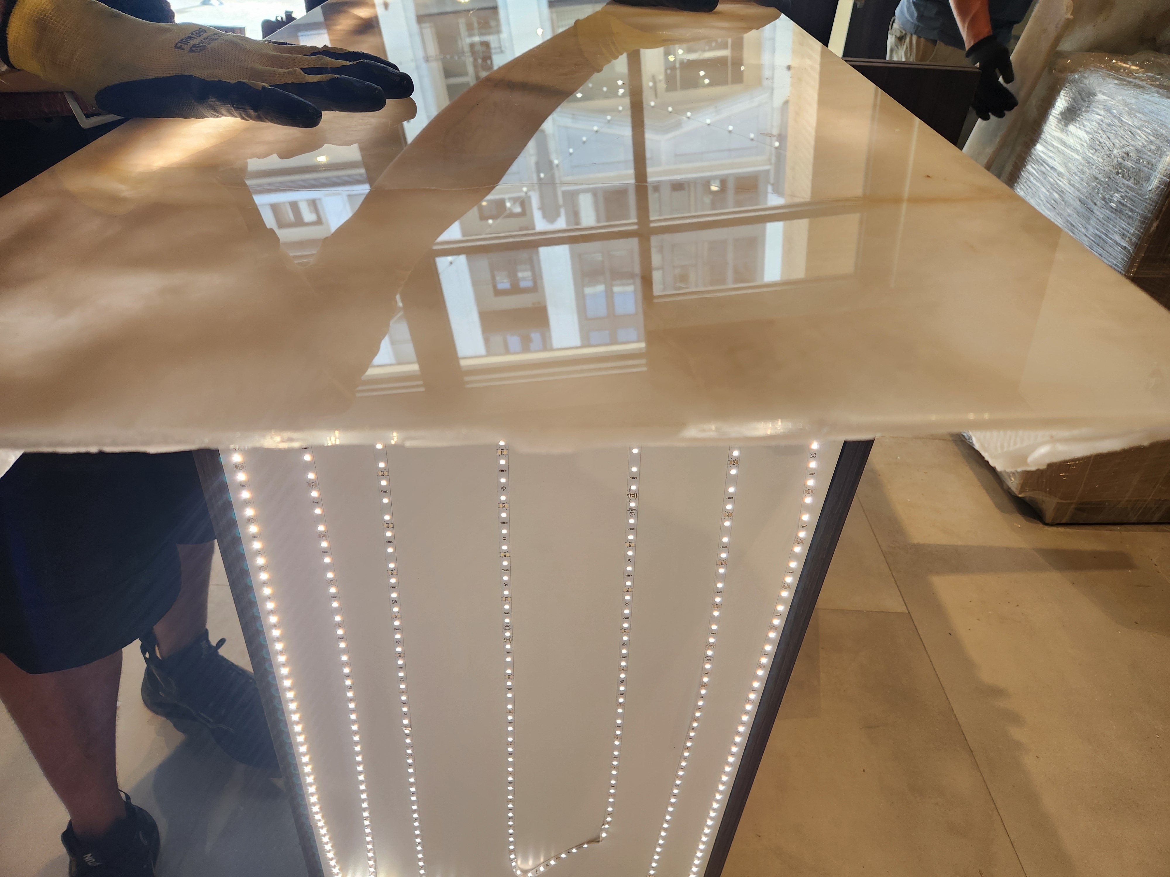 Azzurri Casa Modern Wood Paneled Wet Wine Bar with Wine Wall and Onyx Countertops