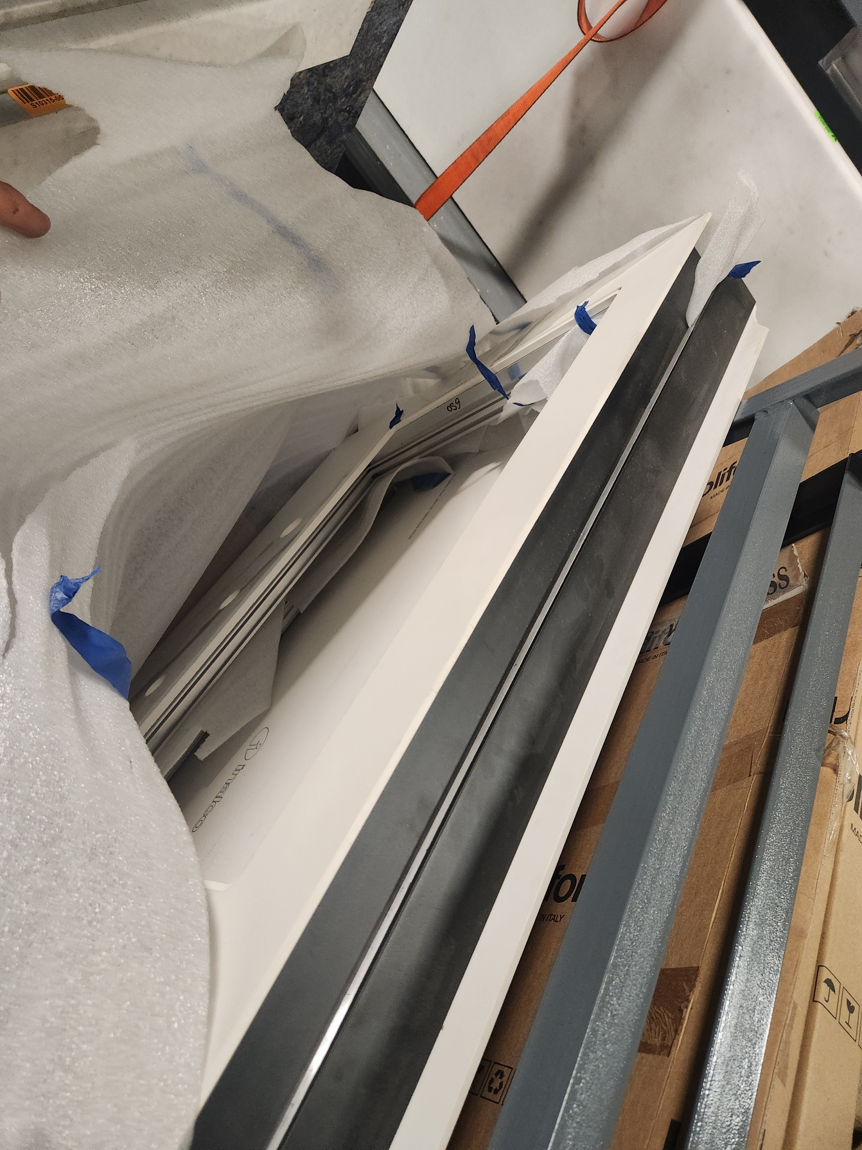 Poliform Phoenix Multi-Tone Modern Kitchen with Artex Island, Stone Countertops and Miele Appliances