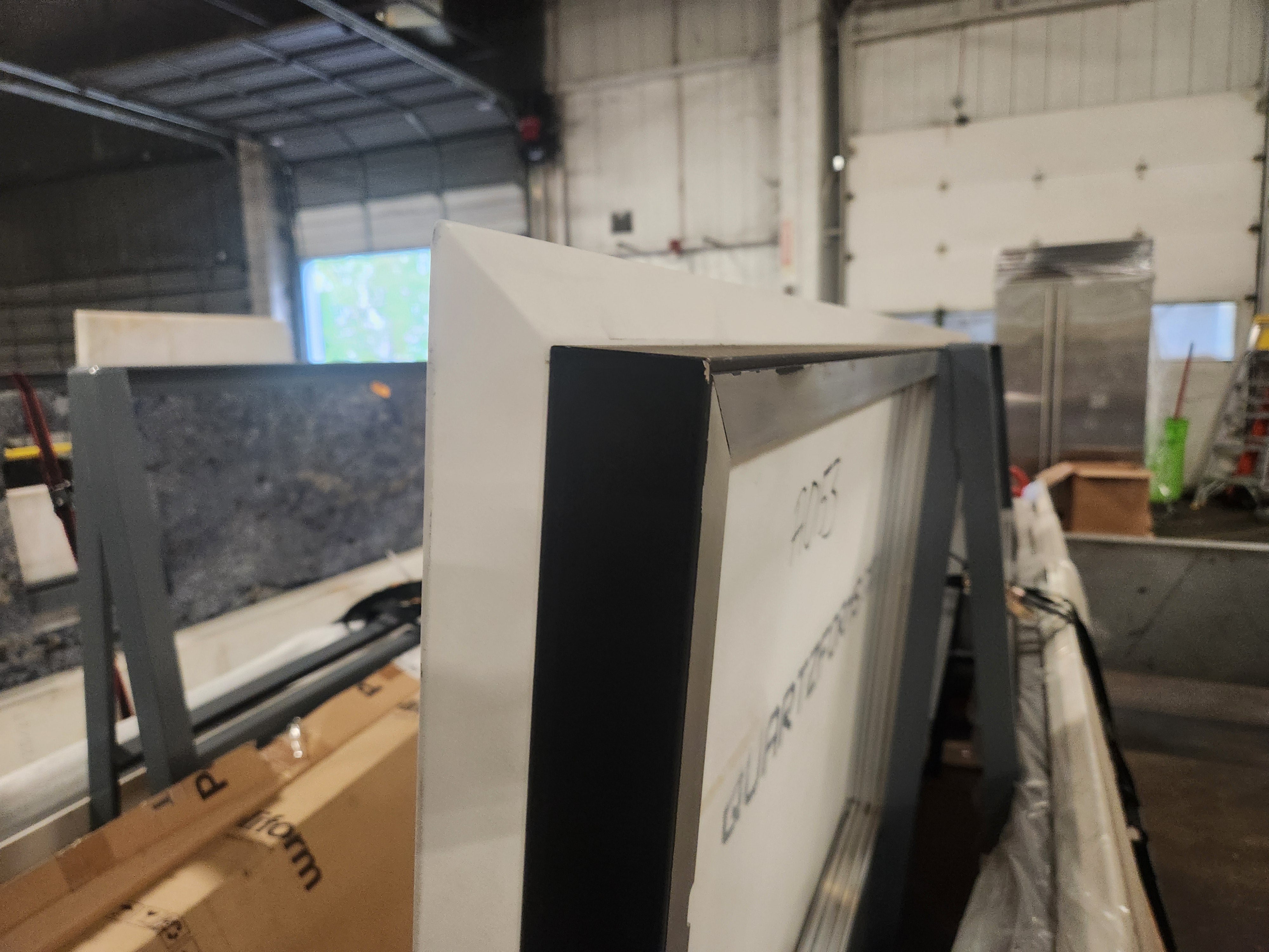 Poliform Phoenix Multi-Tone Modern Kitchen with Artex Island, Stone Countertops and Miele Appliances