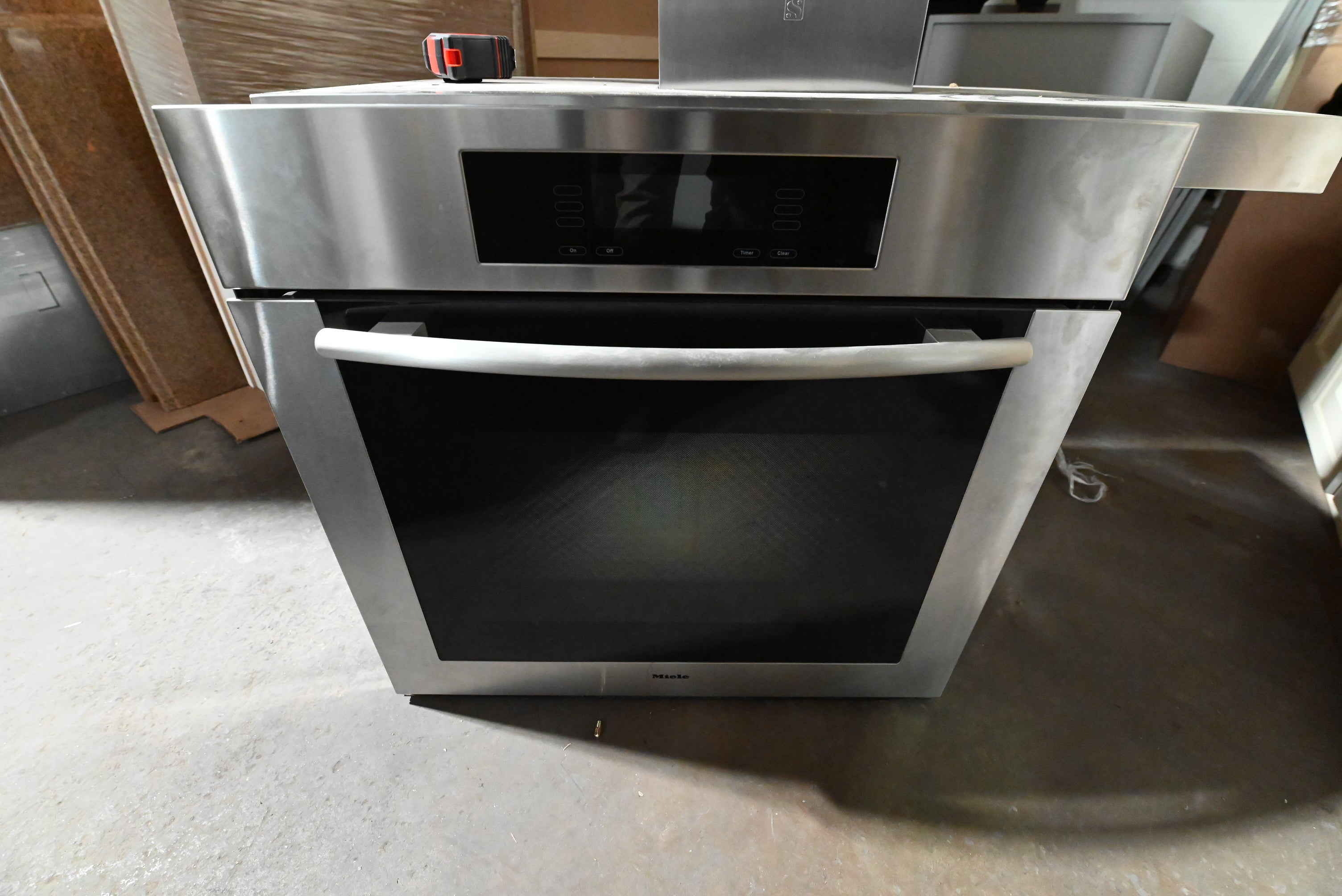 Bulthaup Modern Matte Grey Kitchen with Stone Countertops & Appliances