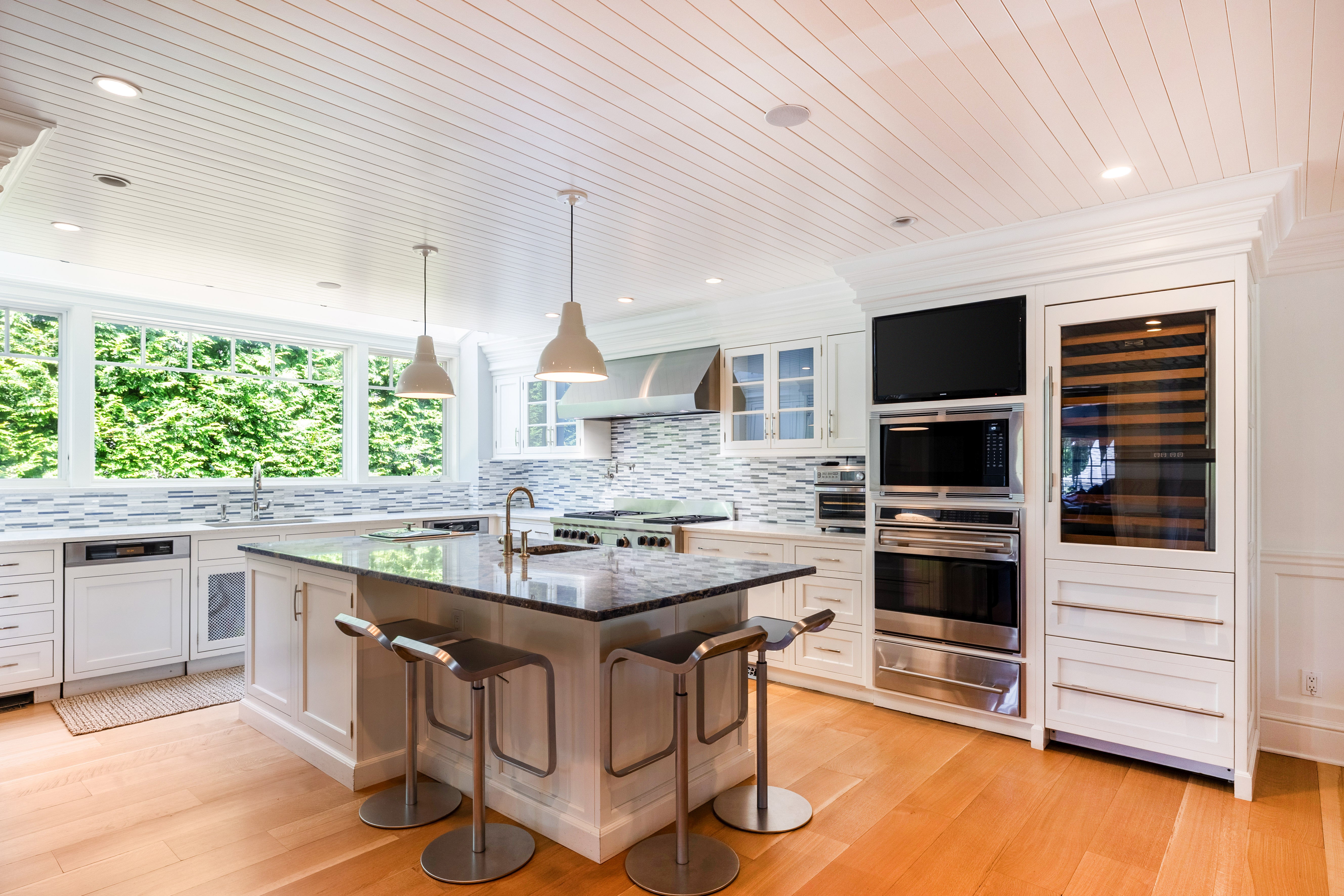 Plain & Fancy Transitional White Kitchen with Island, Countertops and Wolf & Sub-Zero Appliances