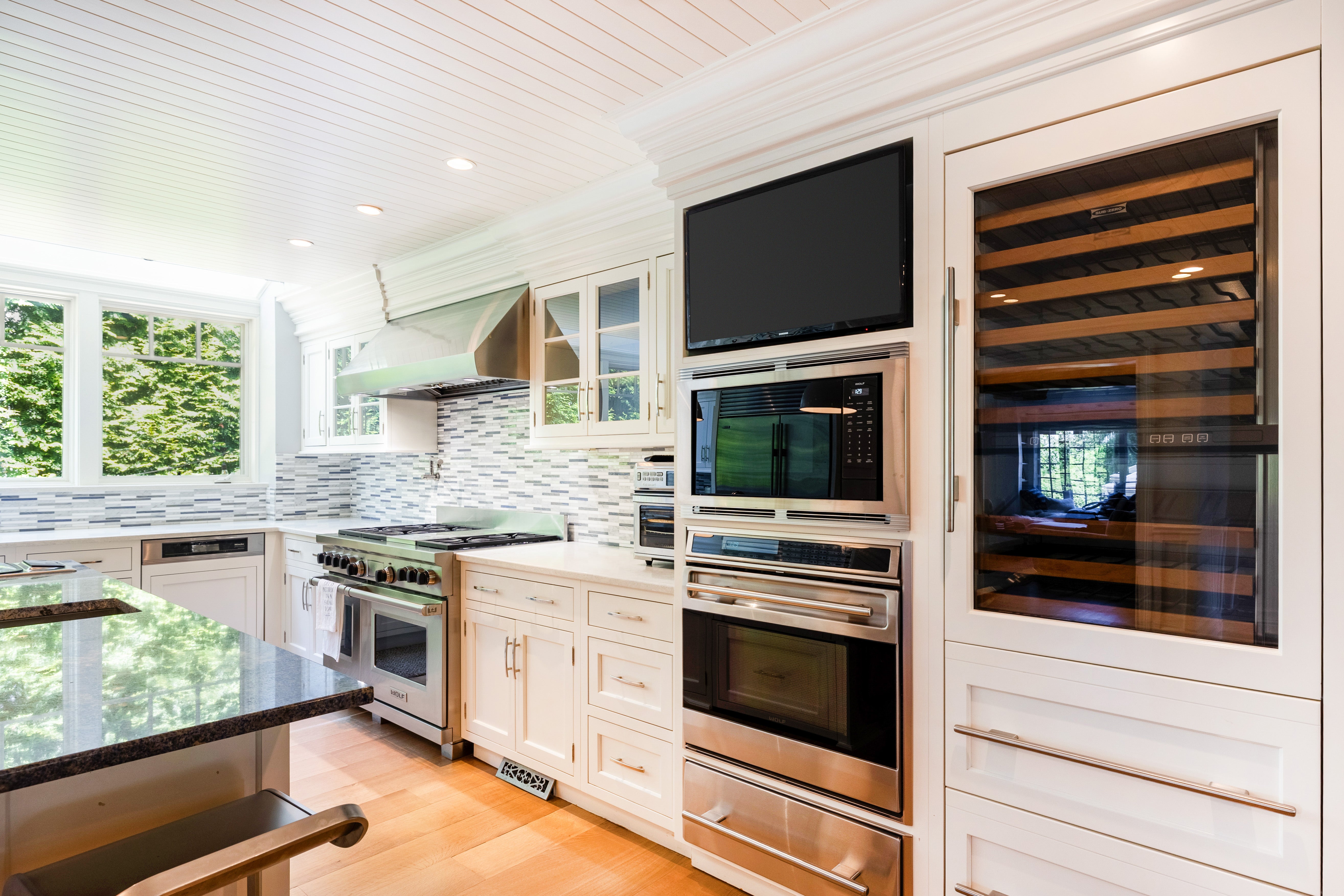 Plain & Fancy Transitional White Kitchen with Island, Countertops and Wolf & Sub-Zero Appliances