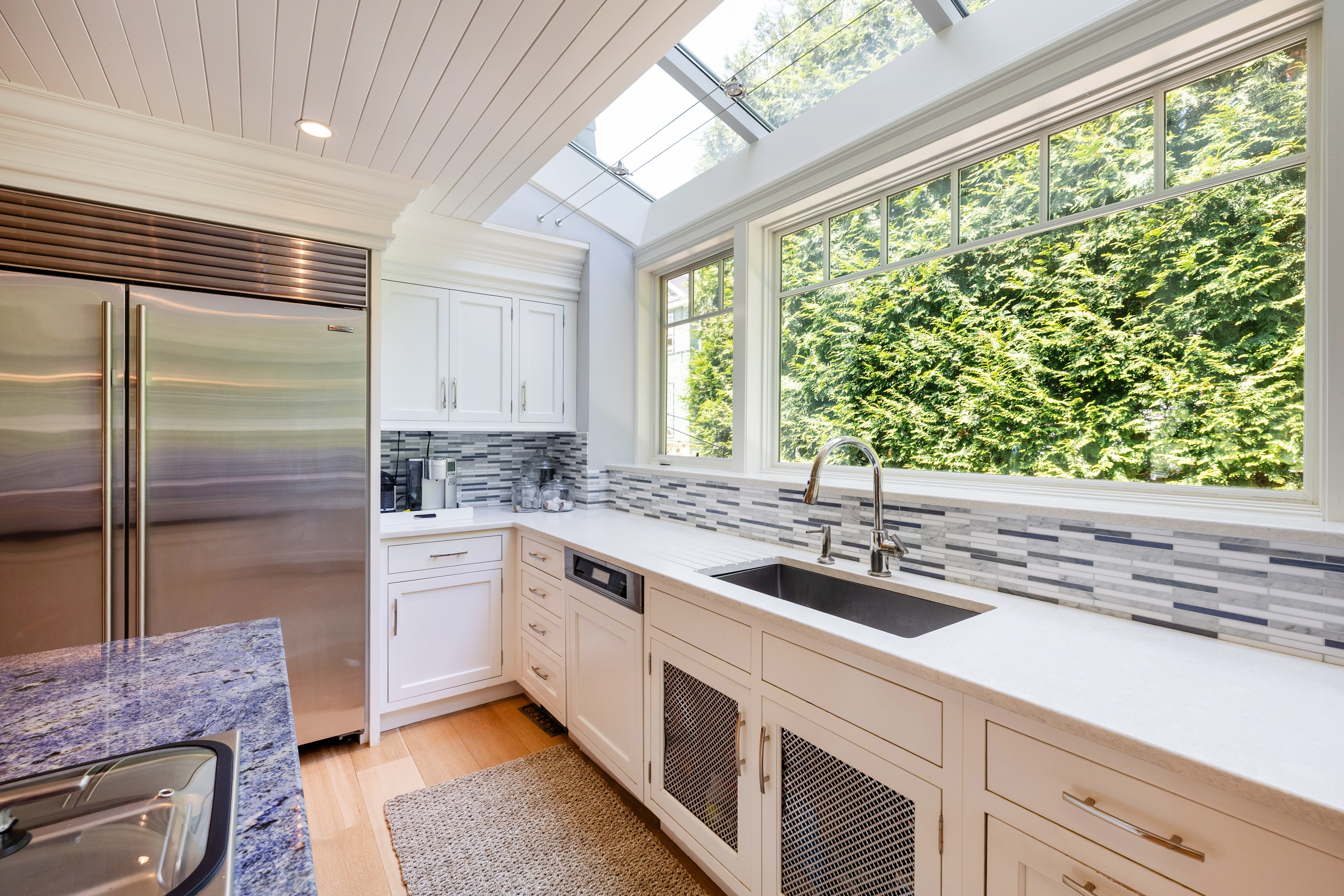 Plain & Fancy Transitional White Kitchen with Island, Countertops and Wolf & Sub-Zero Appliances
