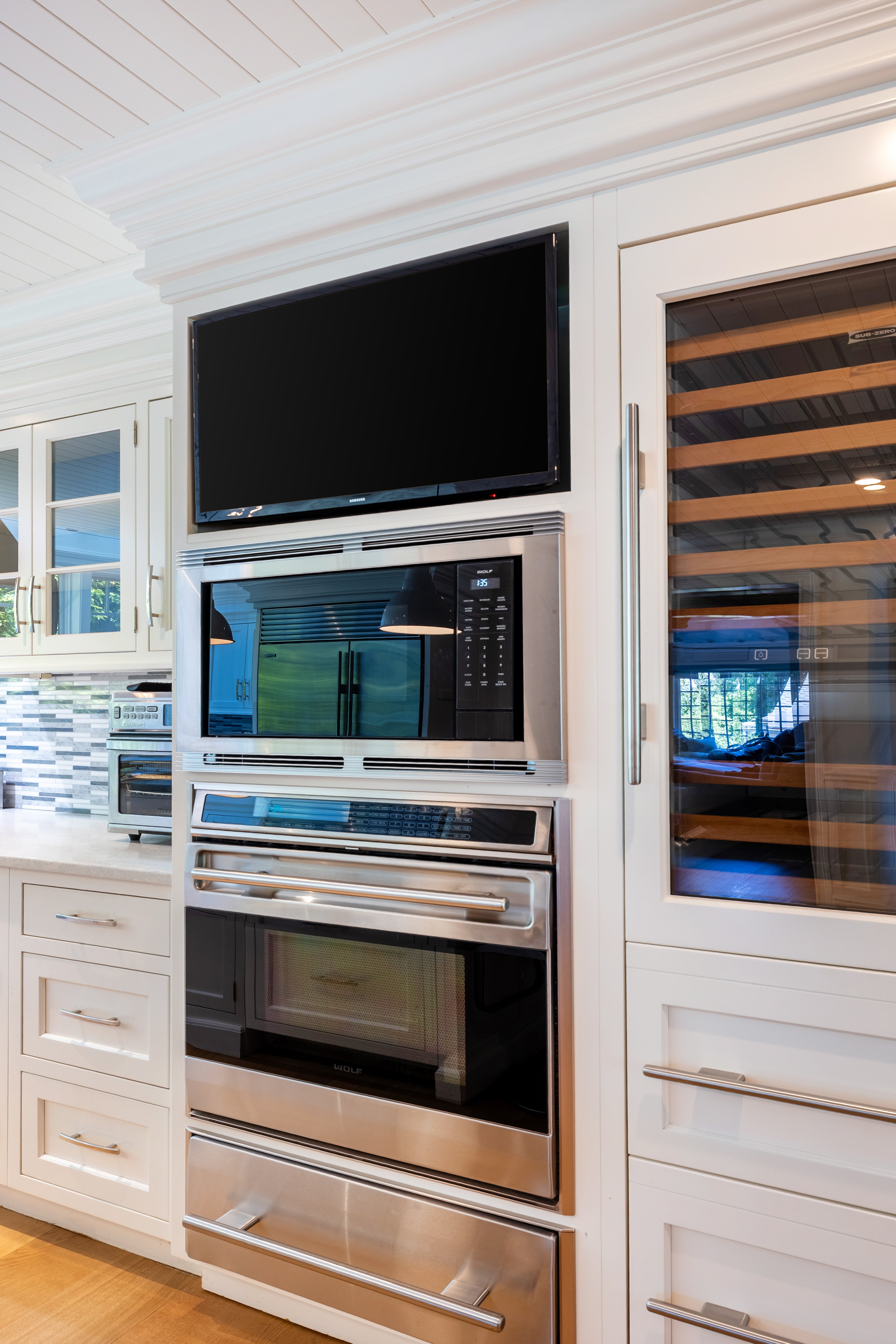Plain & Fancy Transitional White Kitchen with Island, Countertops and Wolf & Sub-Zero Appliances