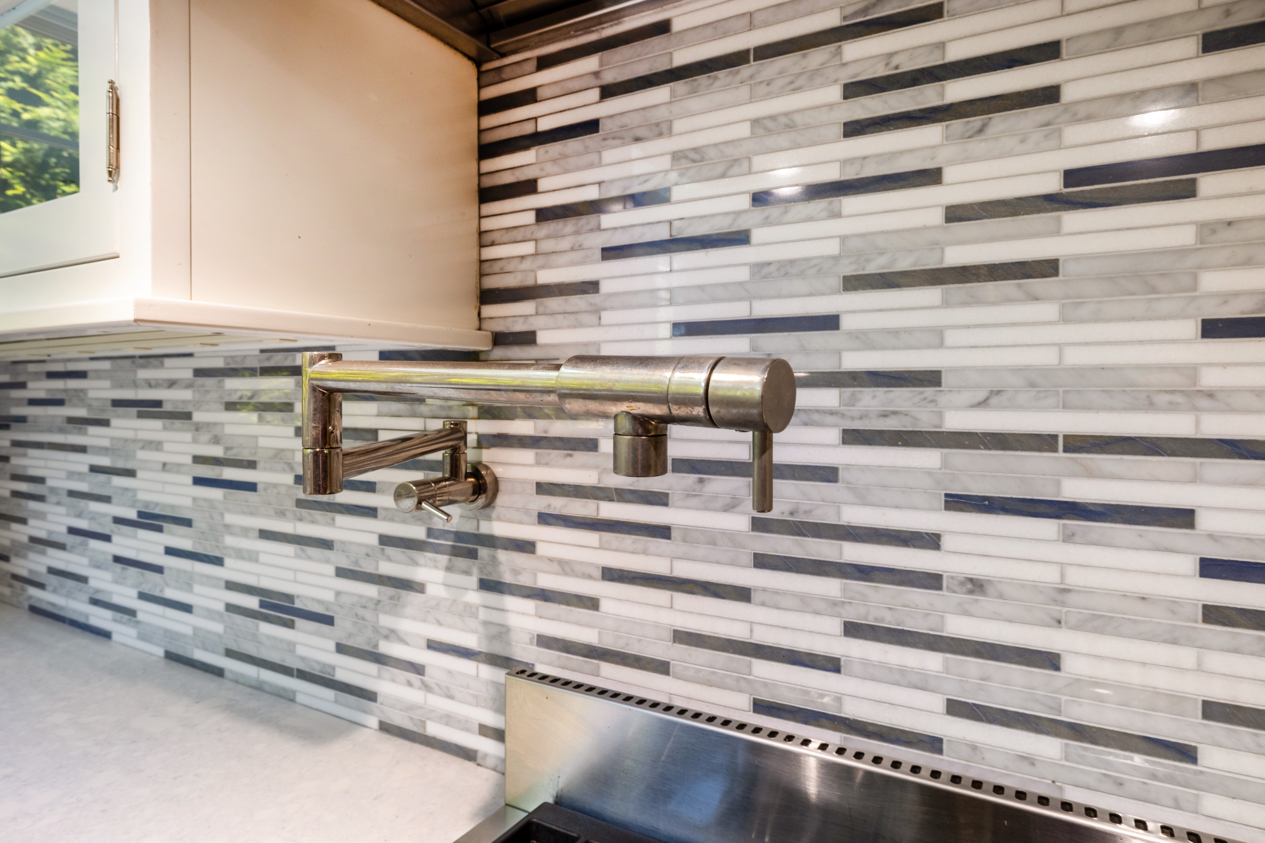 Plain & Fancy Transitional White Kitchen with Island, Countertops and Wolf & Sub-Zero Appliances