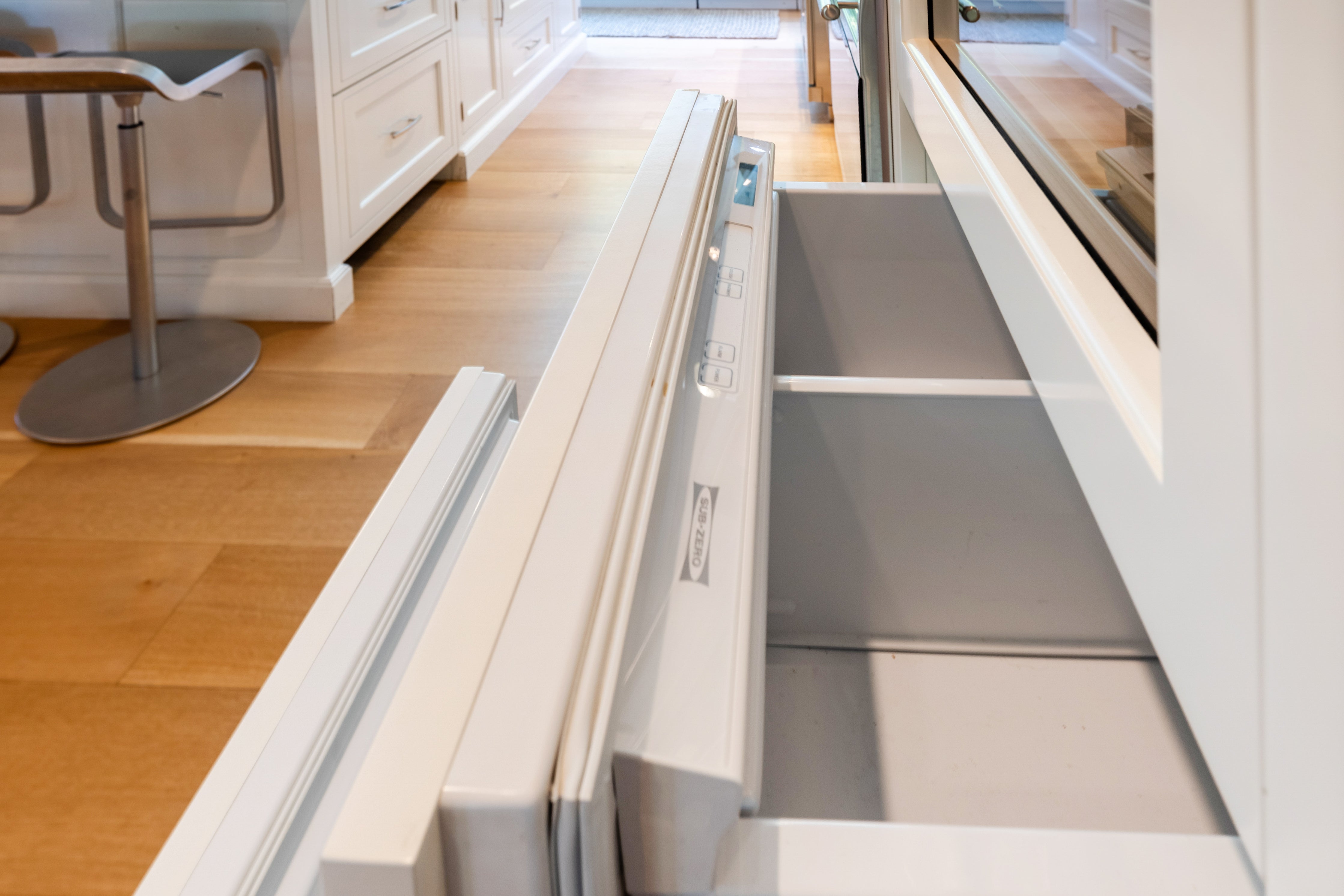 Plain & Fancy Transitional White Kitchen with Island, Countertops and Wolf & Sub-Zero Appliances