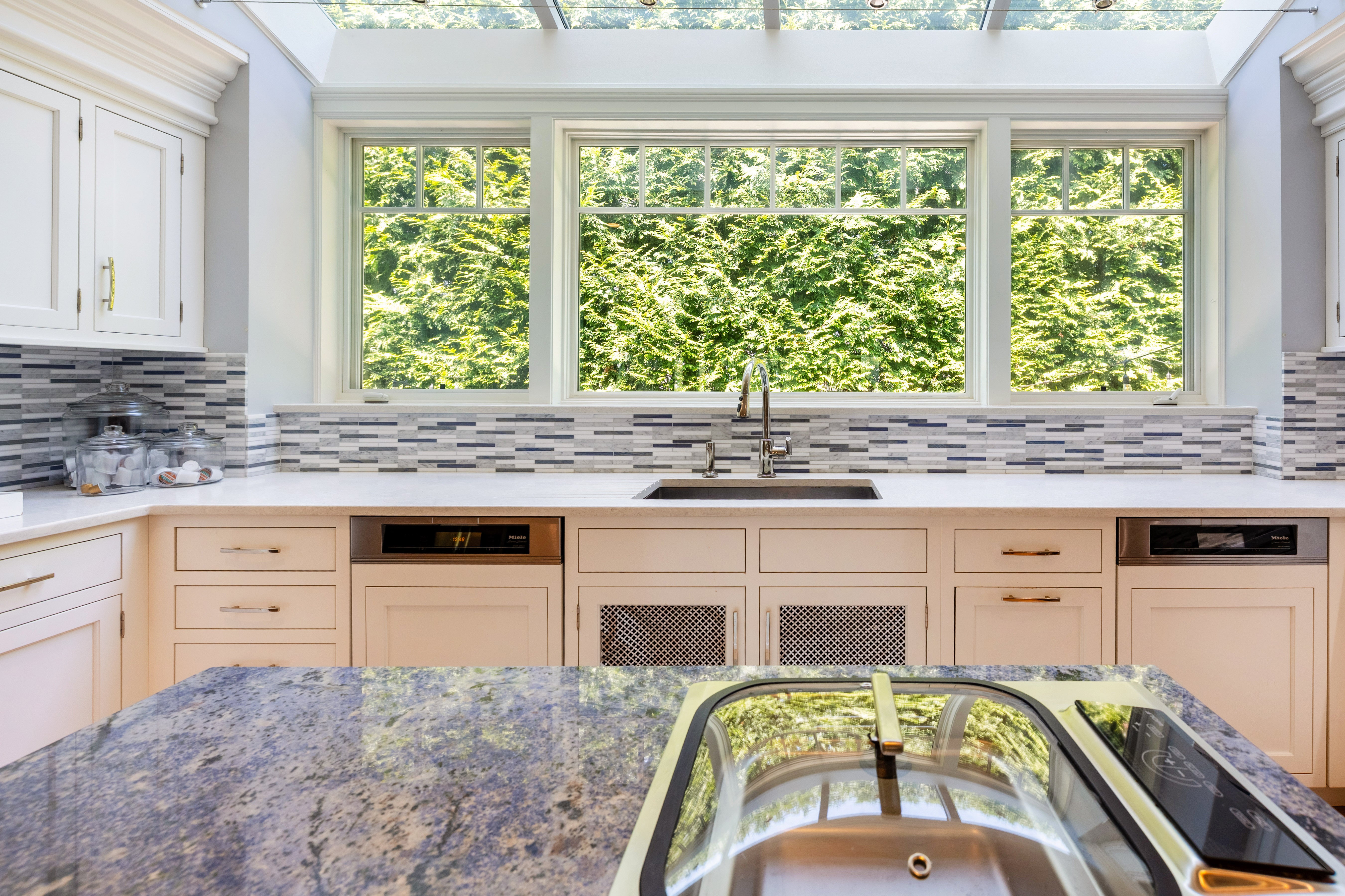 Plain & Fancy Transitional White Kitchen with Island, Countertops and Wolf & Sub-Zero Appliances