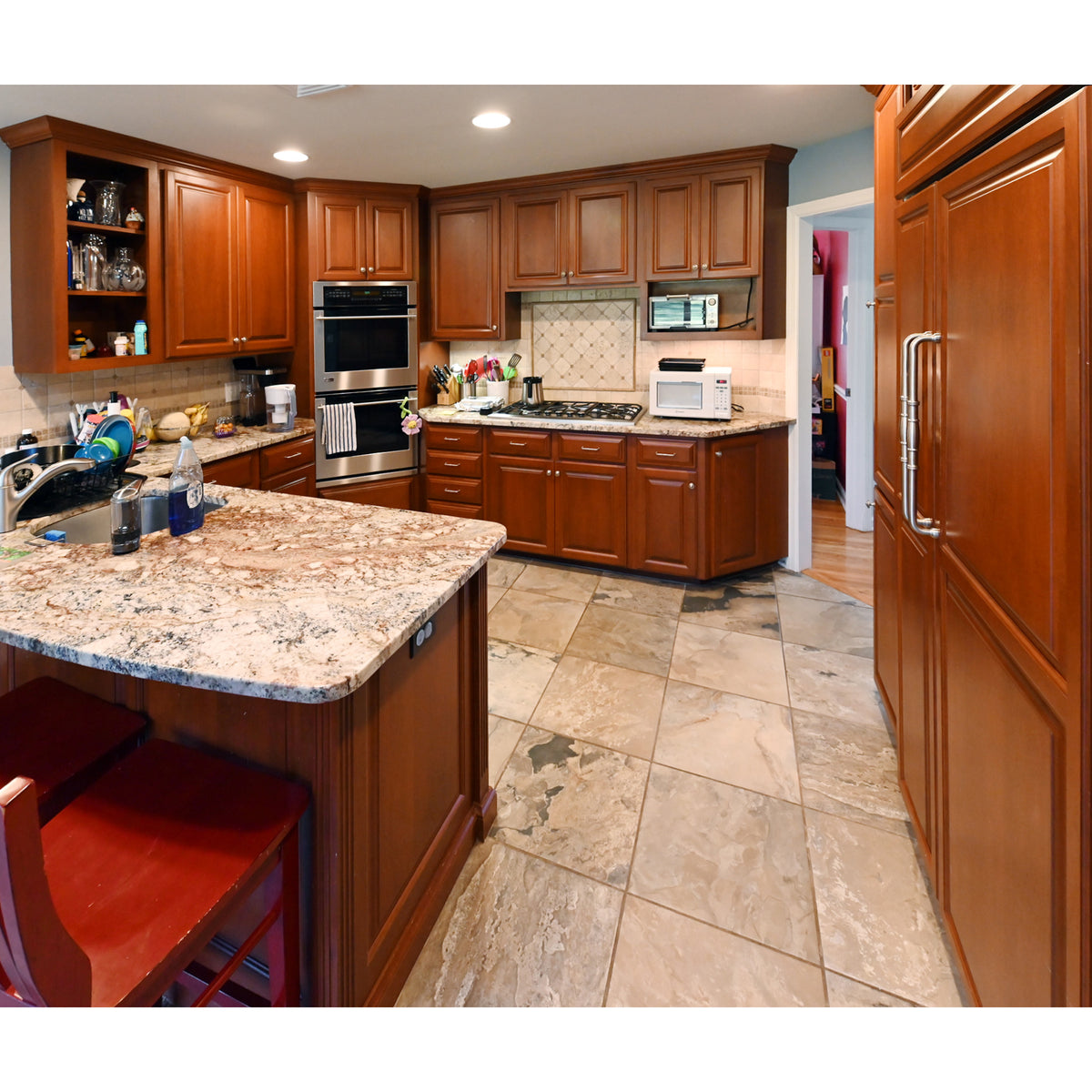 Ackley Cabinet Timeless Cherry & Stainless Traditional Pre-Owned Kitchen