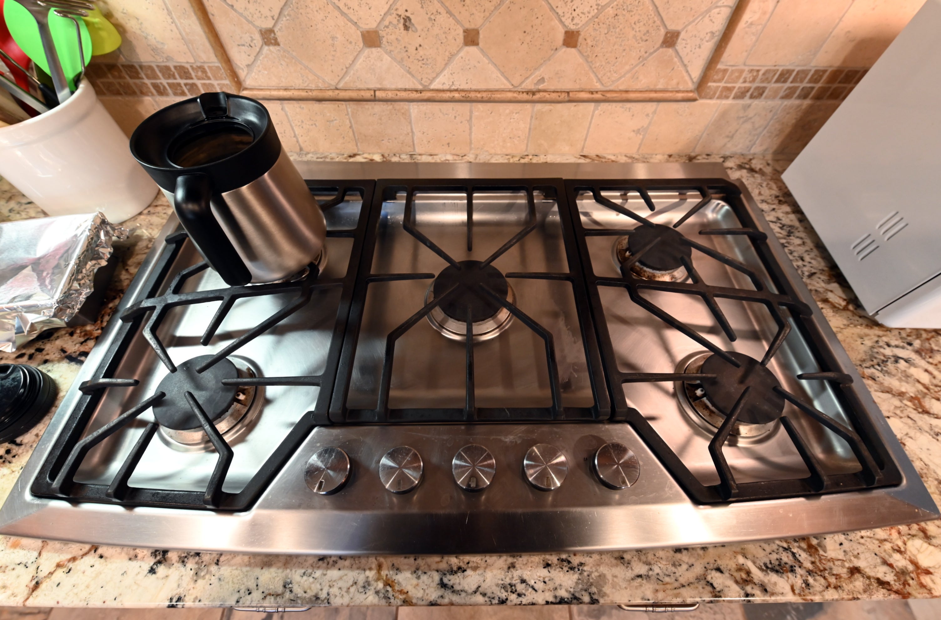 Ackley Cabinet Timeless Cherry & Stainless Traditional Pre-Owned Kitchen