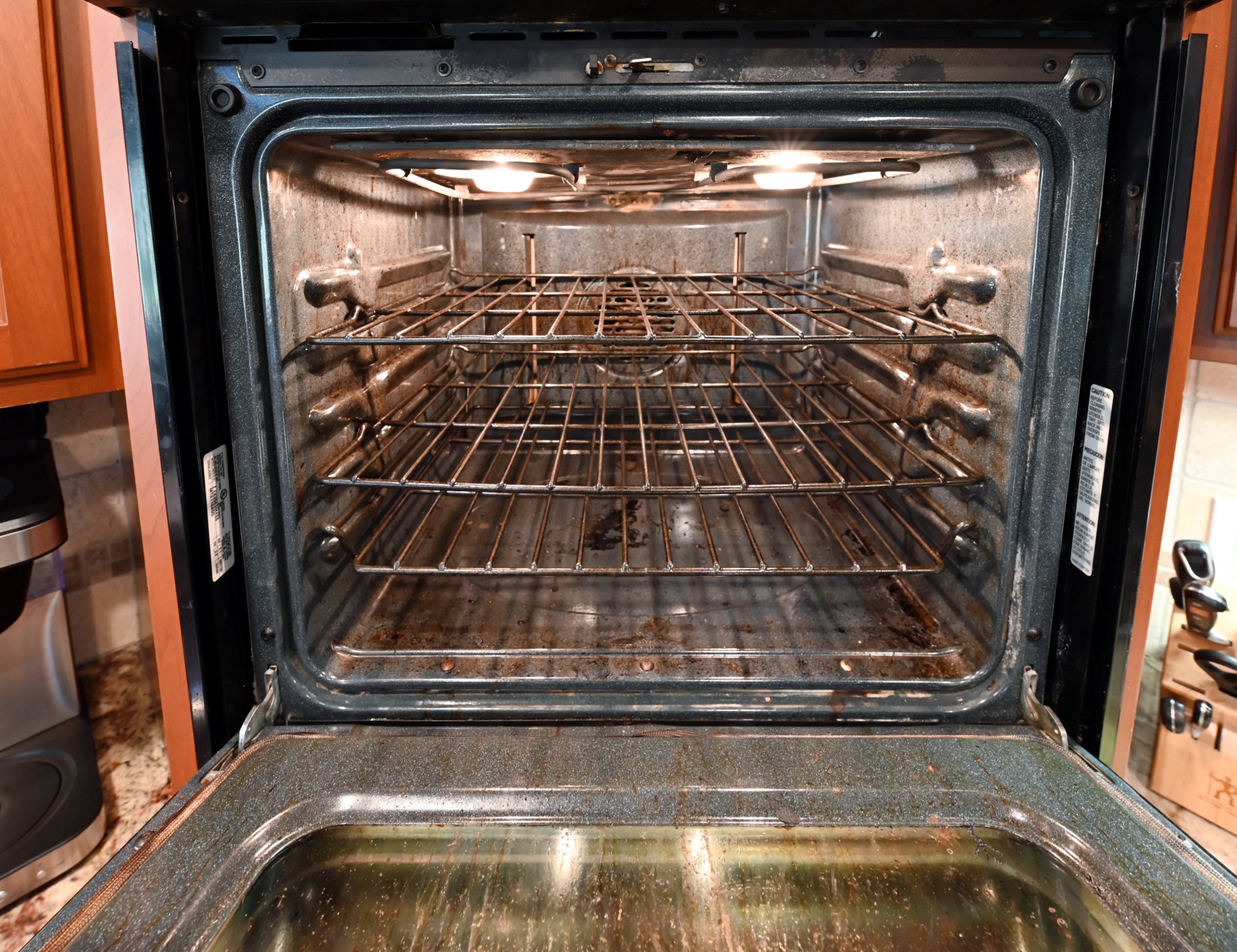 Ackley Cabinet Timeless Cherry & Stainless Traditional Pre-Owned Kitchen