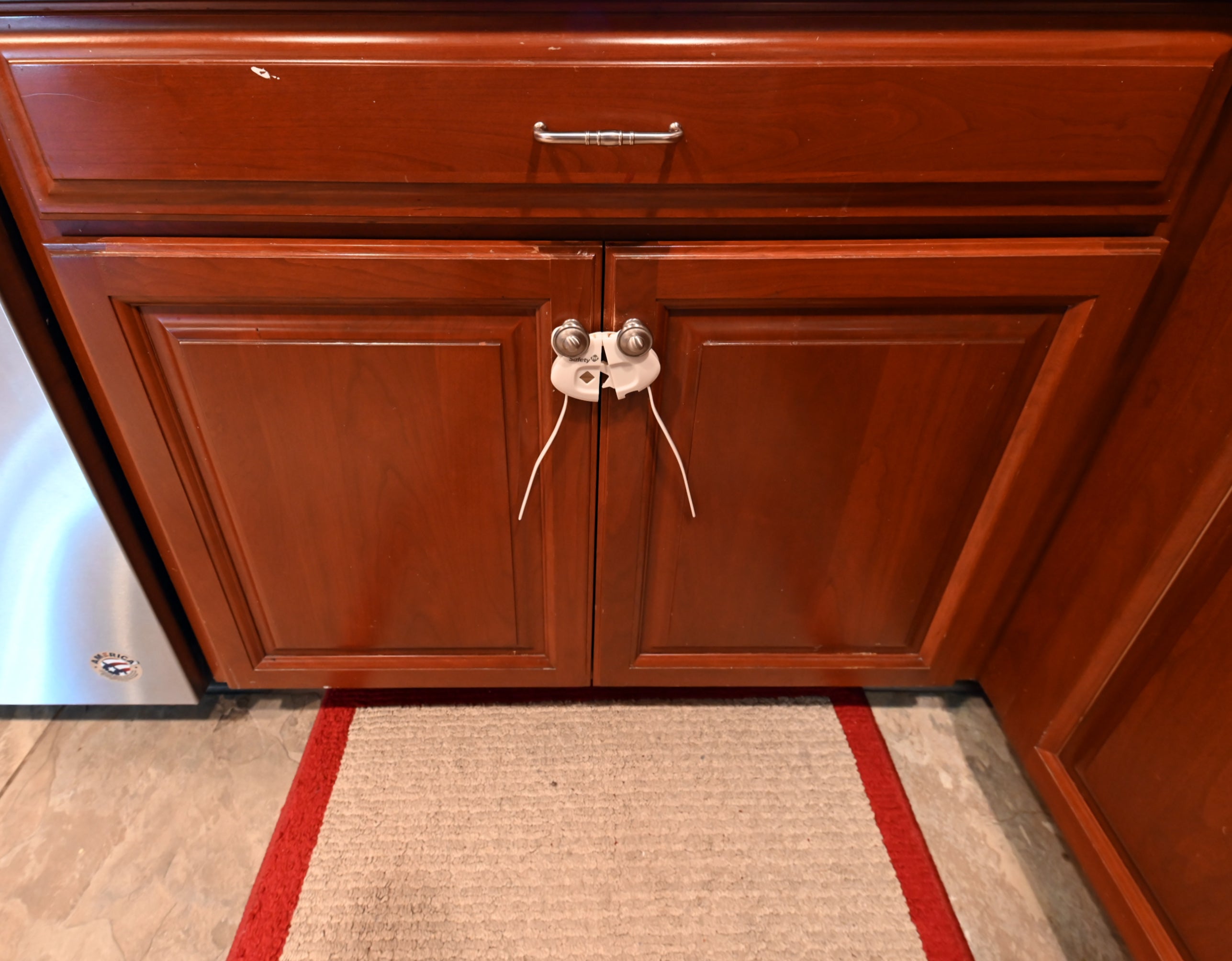 Ackley Cabinet Timeless Cherry & Stainless Traditional Pre-Owned Kitchen