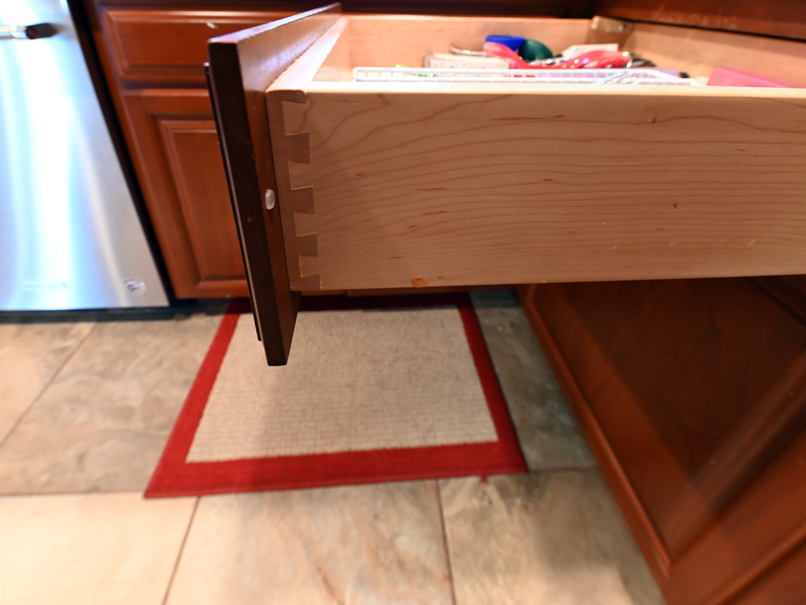 Ackley Cabinet Timeless Cherry & Stainless Traditional Pre-Owned Kitchen