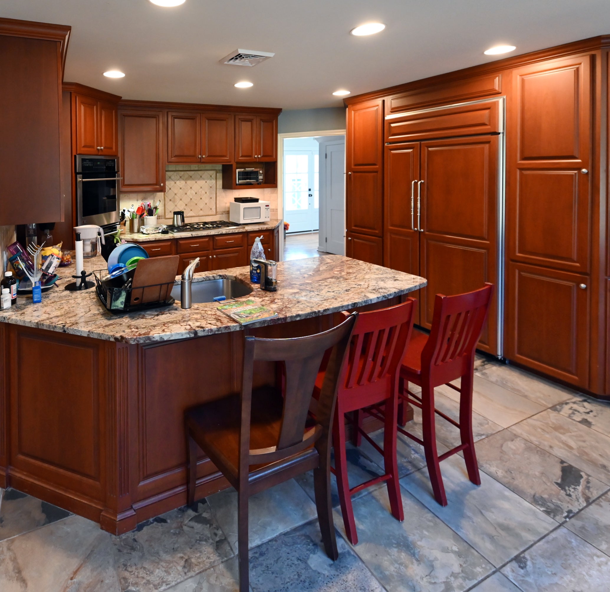 Ackley Cabinet Timeless Cherry & Stainless Traditional Pre-Owned Kitchen