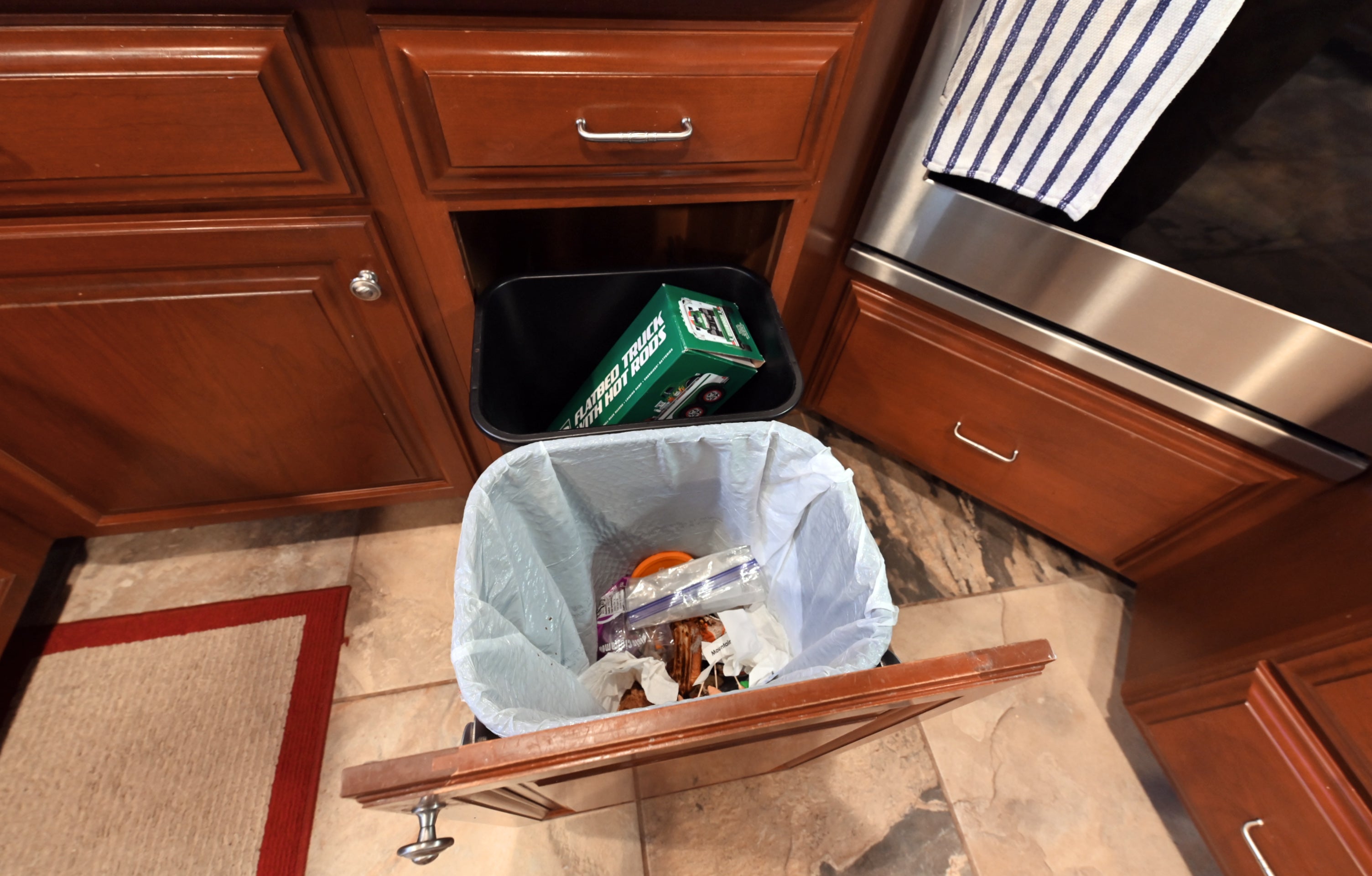 Ackley Cabinet Timeless Cherry & Stainless Traditional Pre-Owned Kitchen