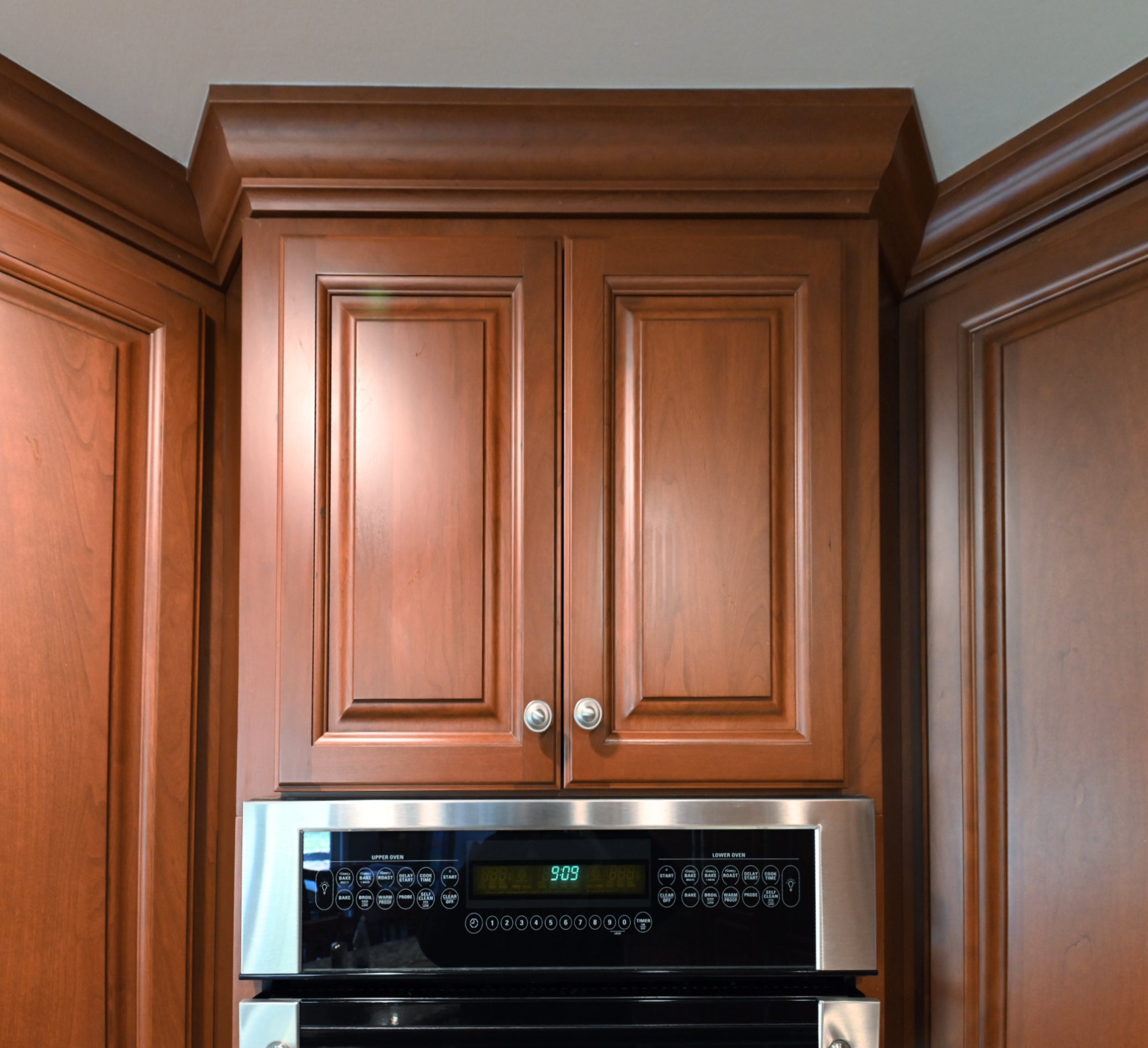 Ackley Cabinet Timeless Cherry & Stainless Traditional Pre-Owned Kitchen